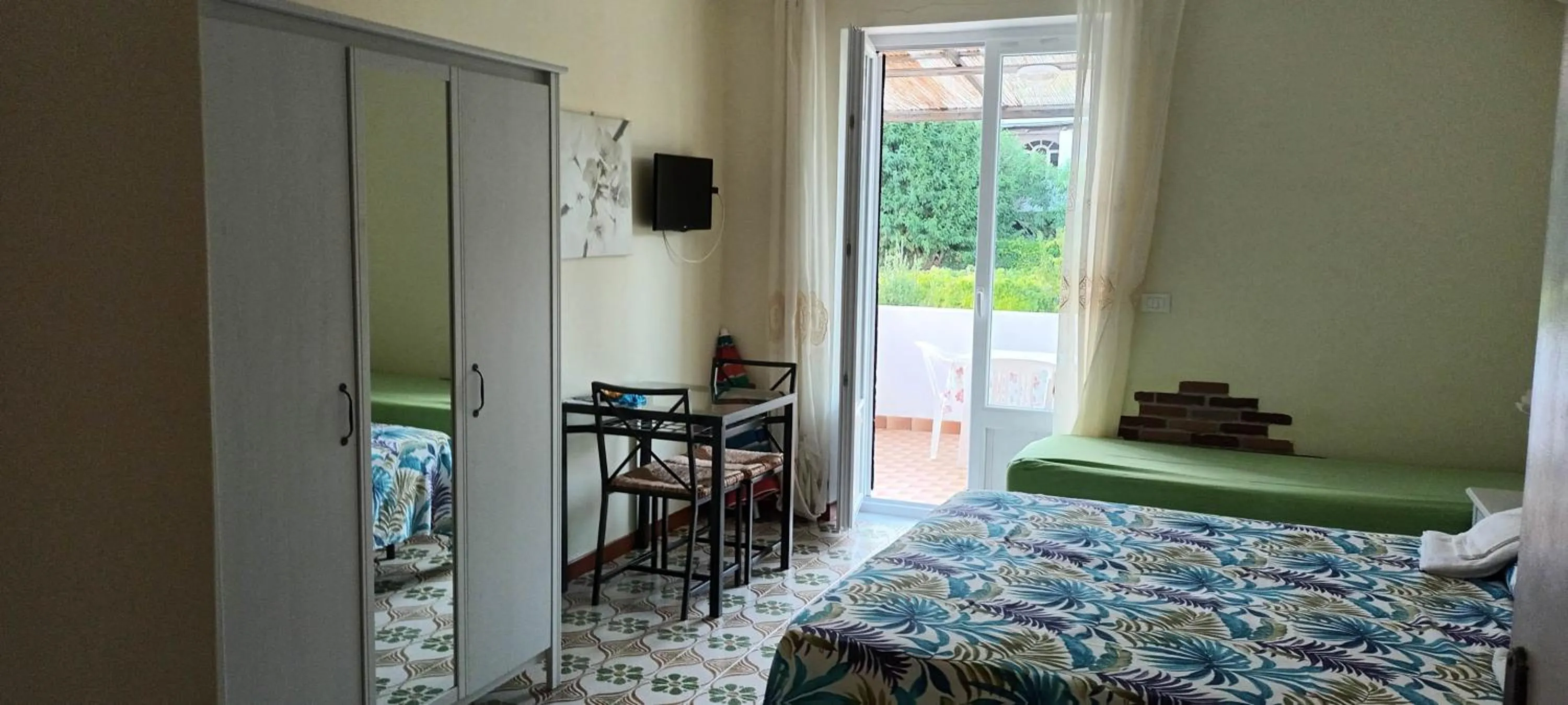 Bed in Villa Olivia Residence Ischia - Monolocali e Bilocali nel Verde con Piscine e Vista Mare