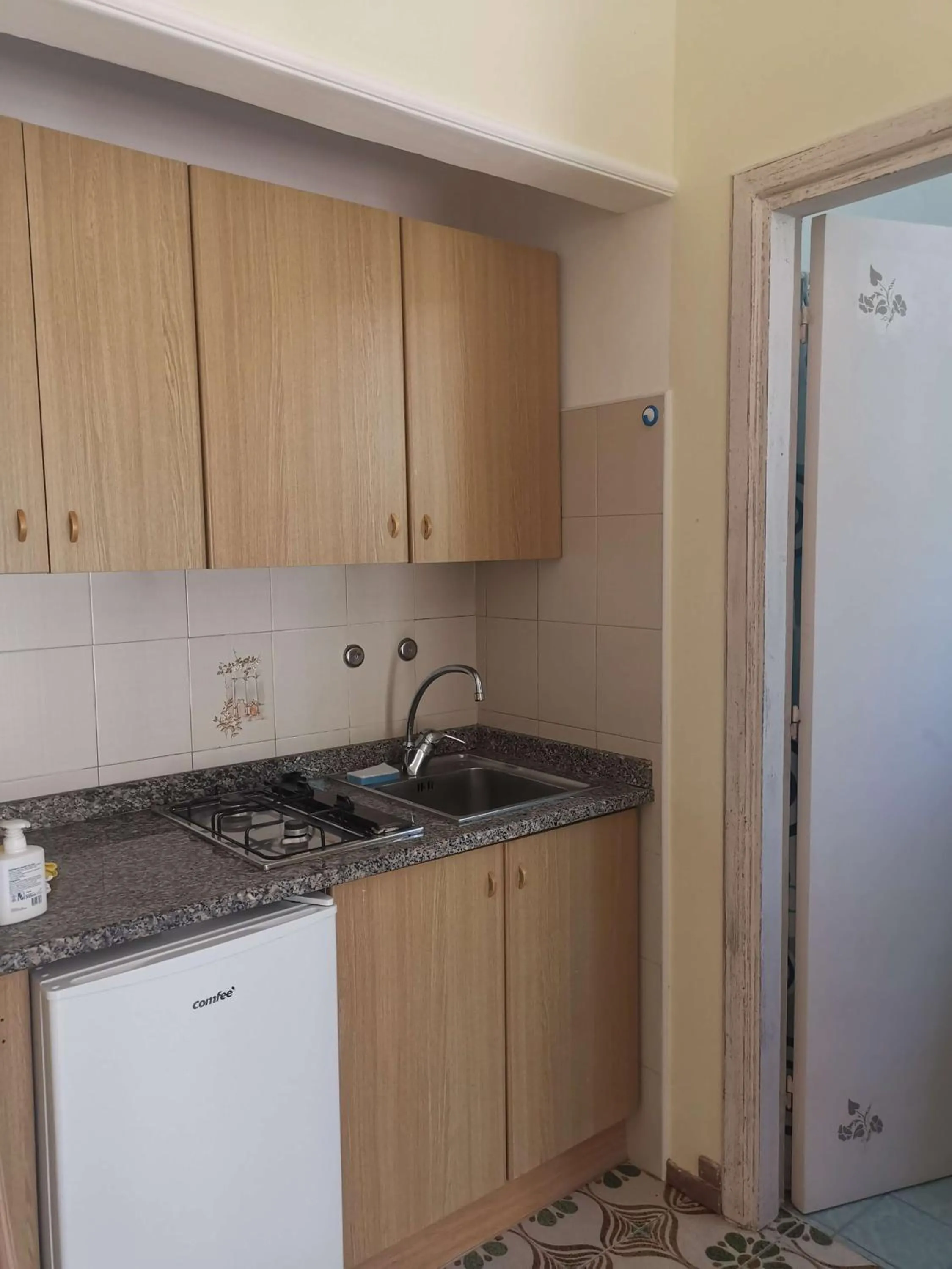 Kitchen or kitchenette in Villa Olivia Residence Ischia - Monolocali e Bilocali nel Verde con Piscine e Vista Mare