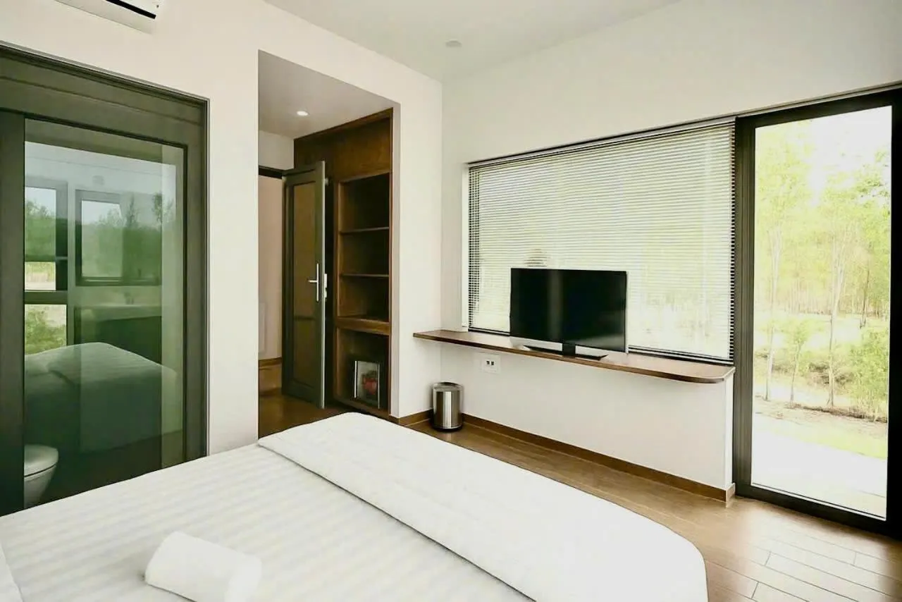 Bedroom, Bed in Nam Hội An Hotel - Near Vinpearl Nam Hội An