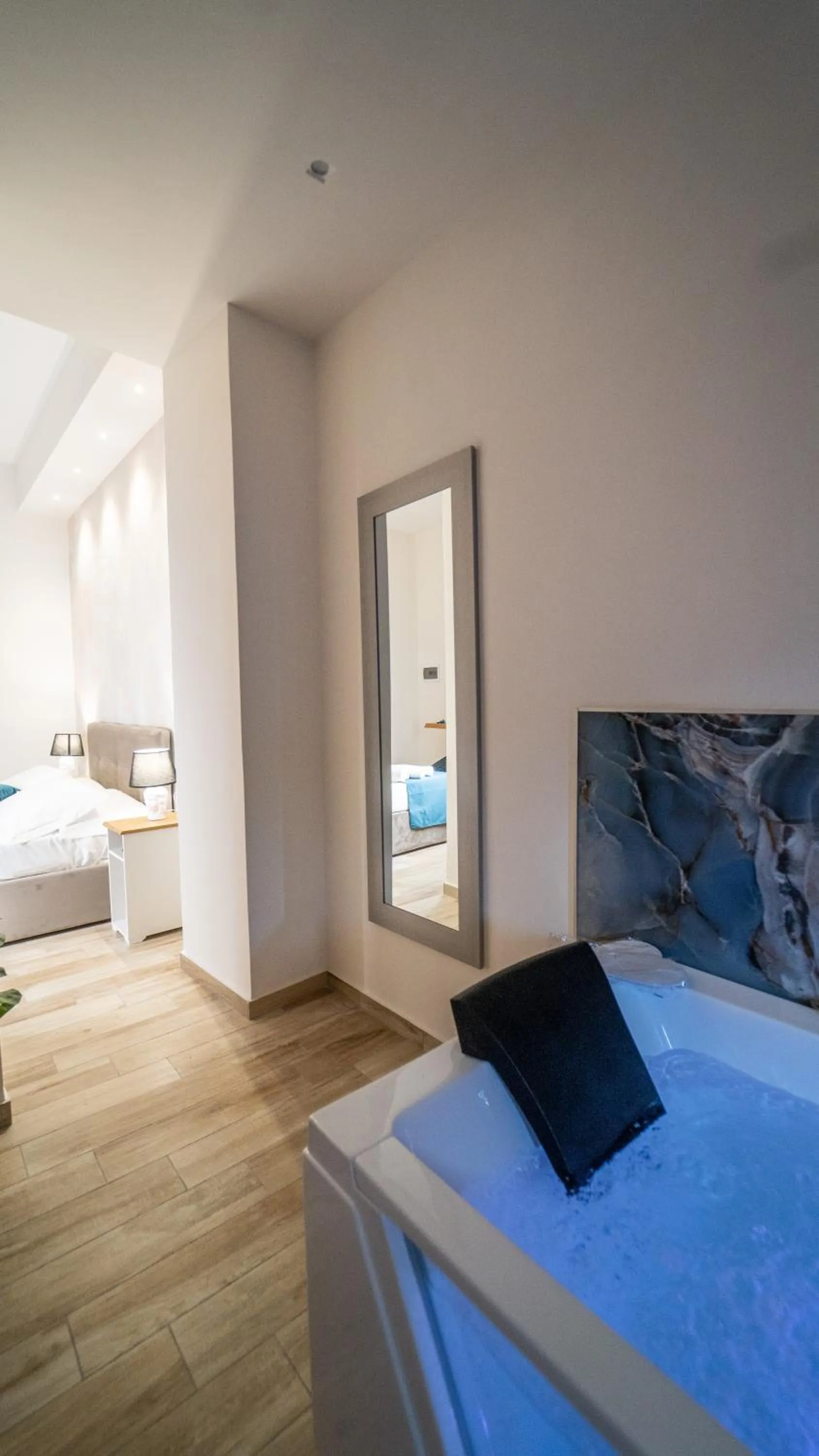 Photo of the whole room, Bed in Sensoria Naxos Suites