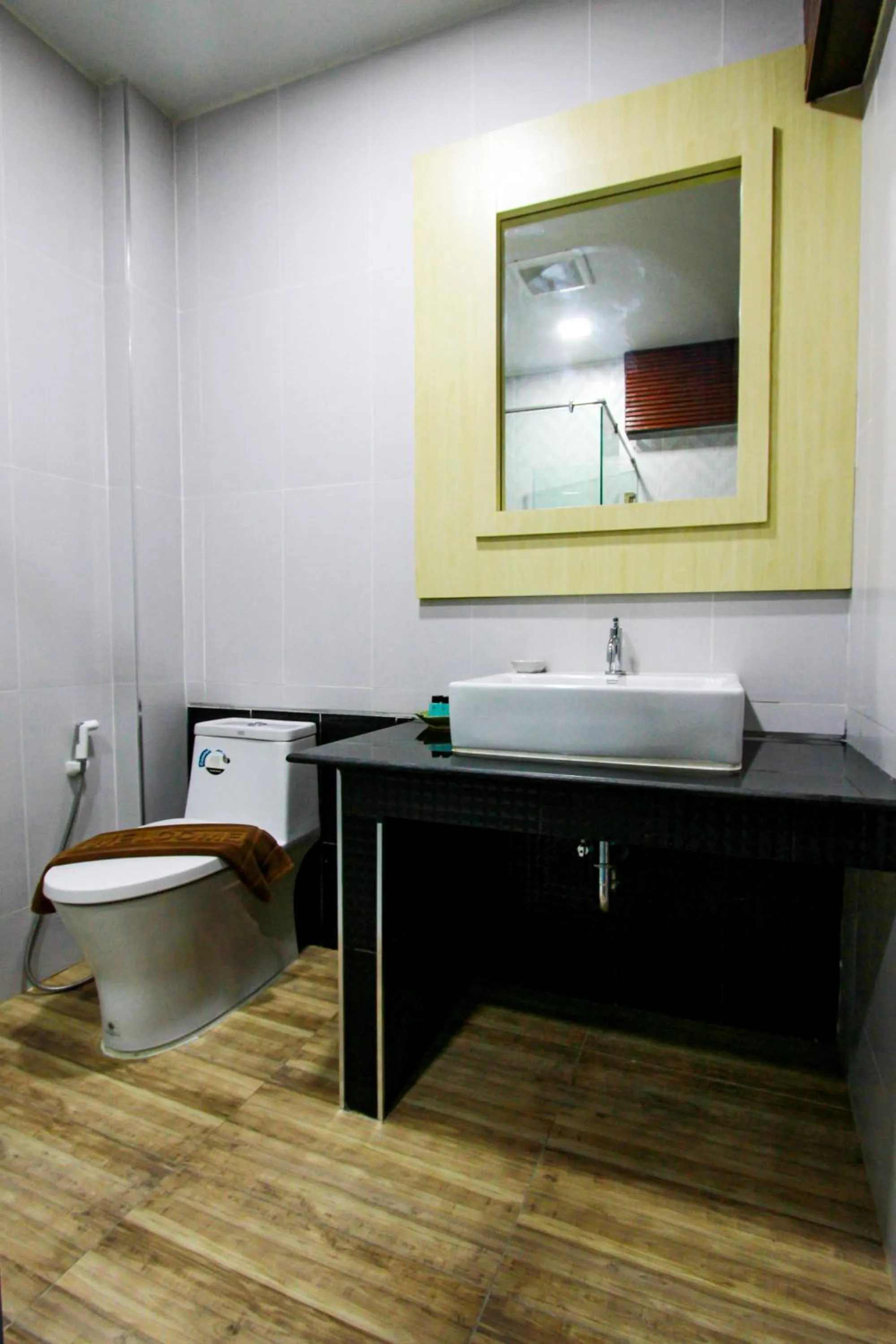 Toilet in Coco Bella Hotel