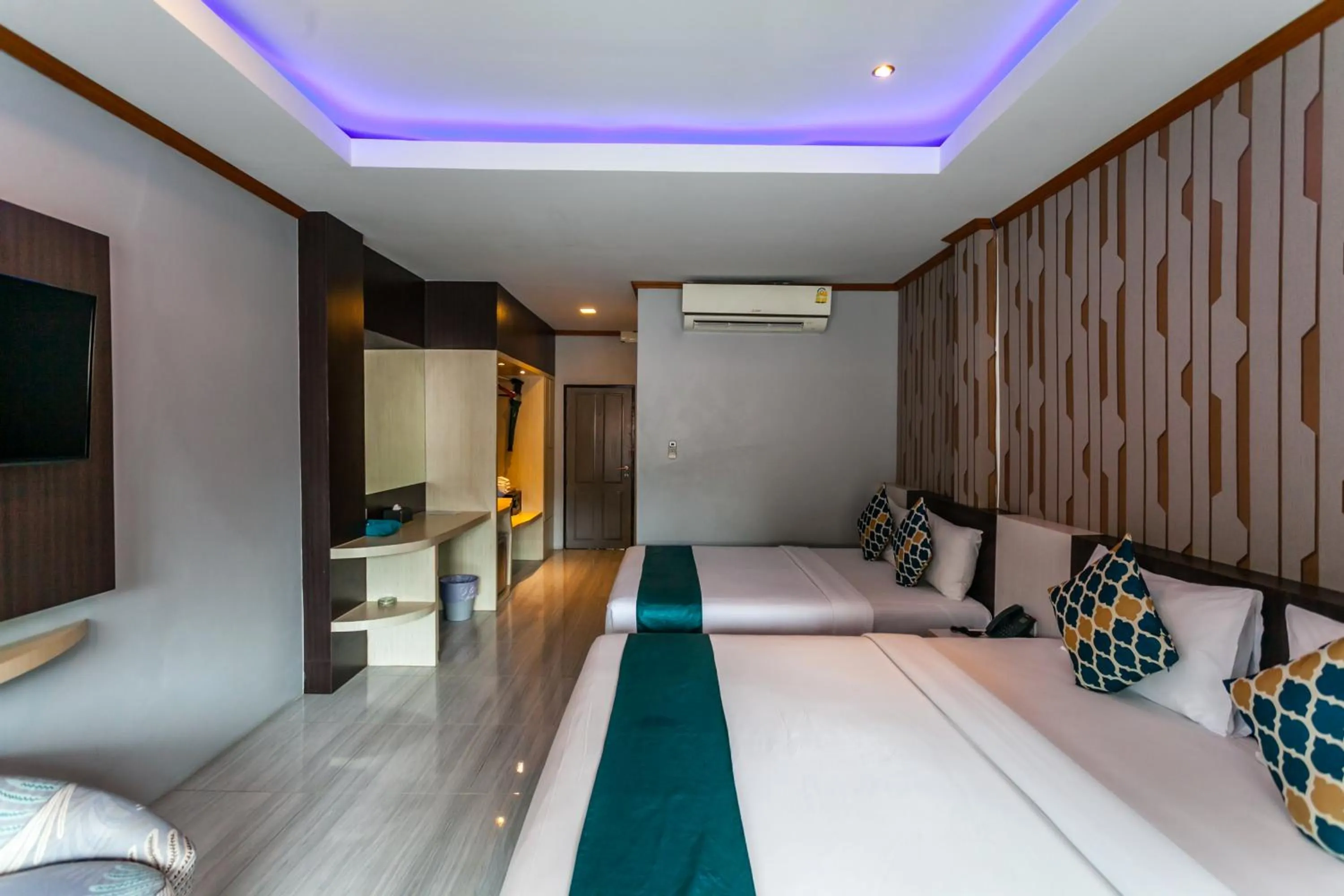 Bed in Coco Bella Hotel