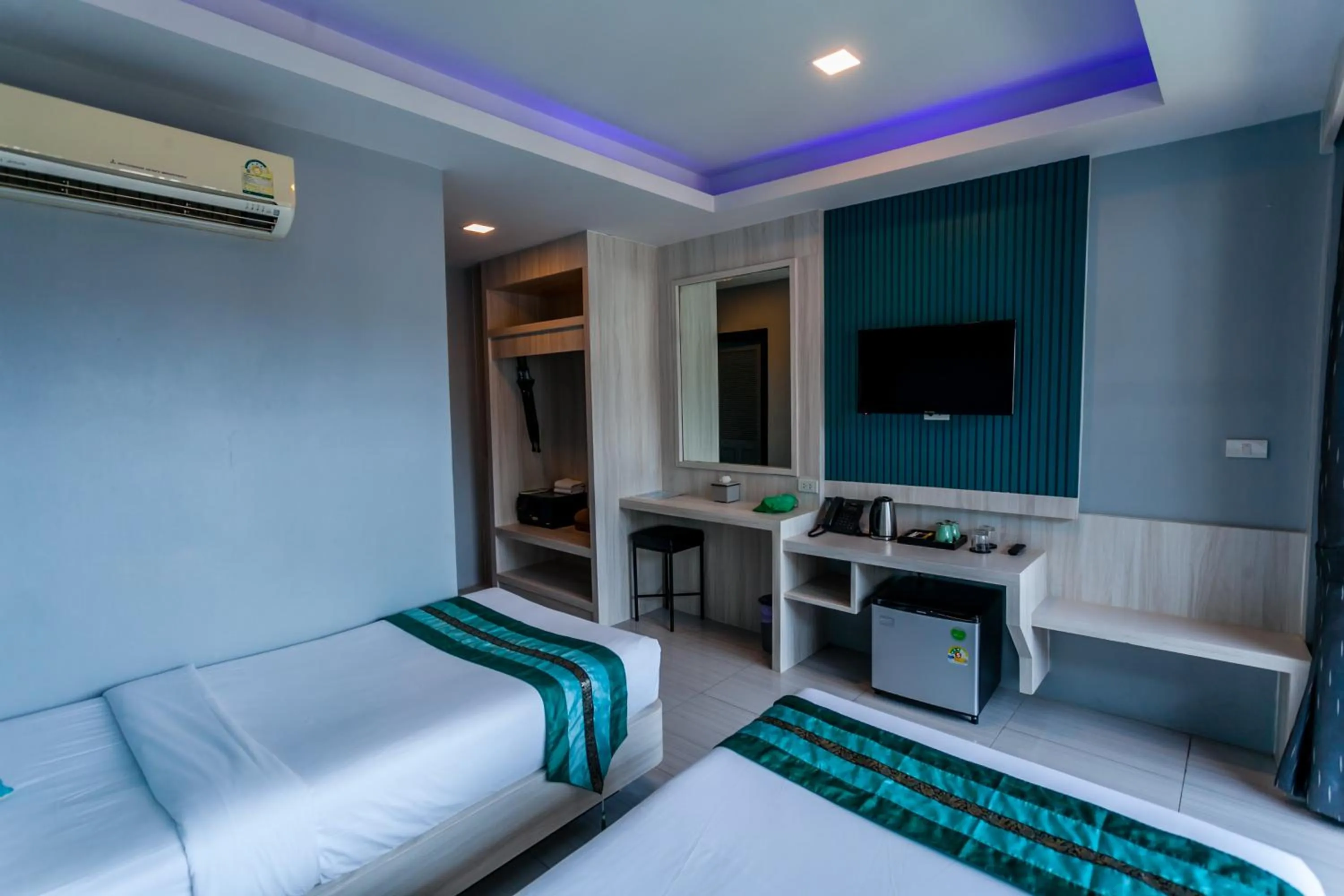 Bed in Coco Bella Hotel