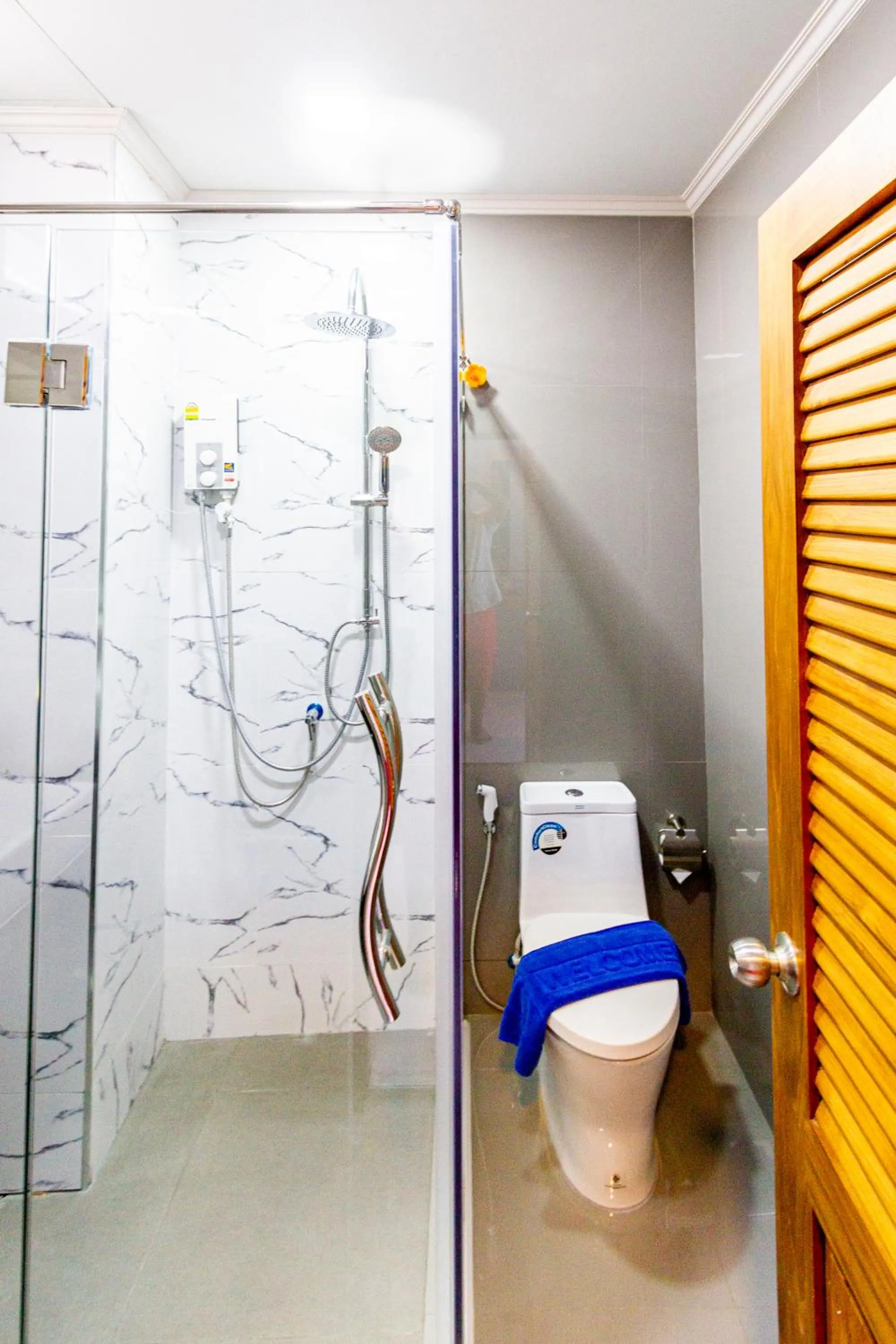 Toilet in Coco Bella Hotel