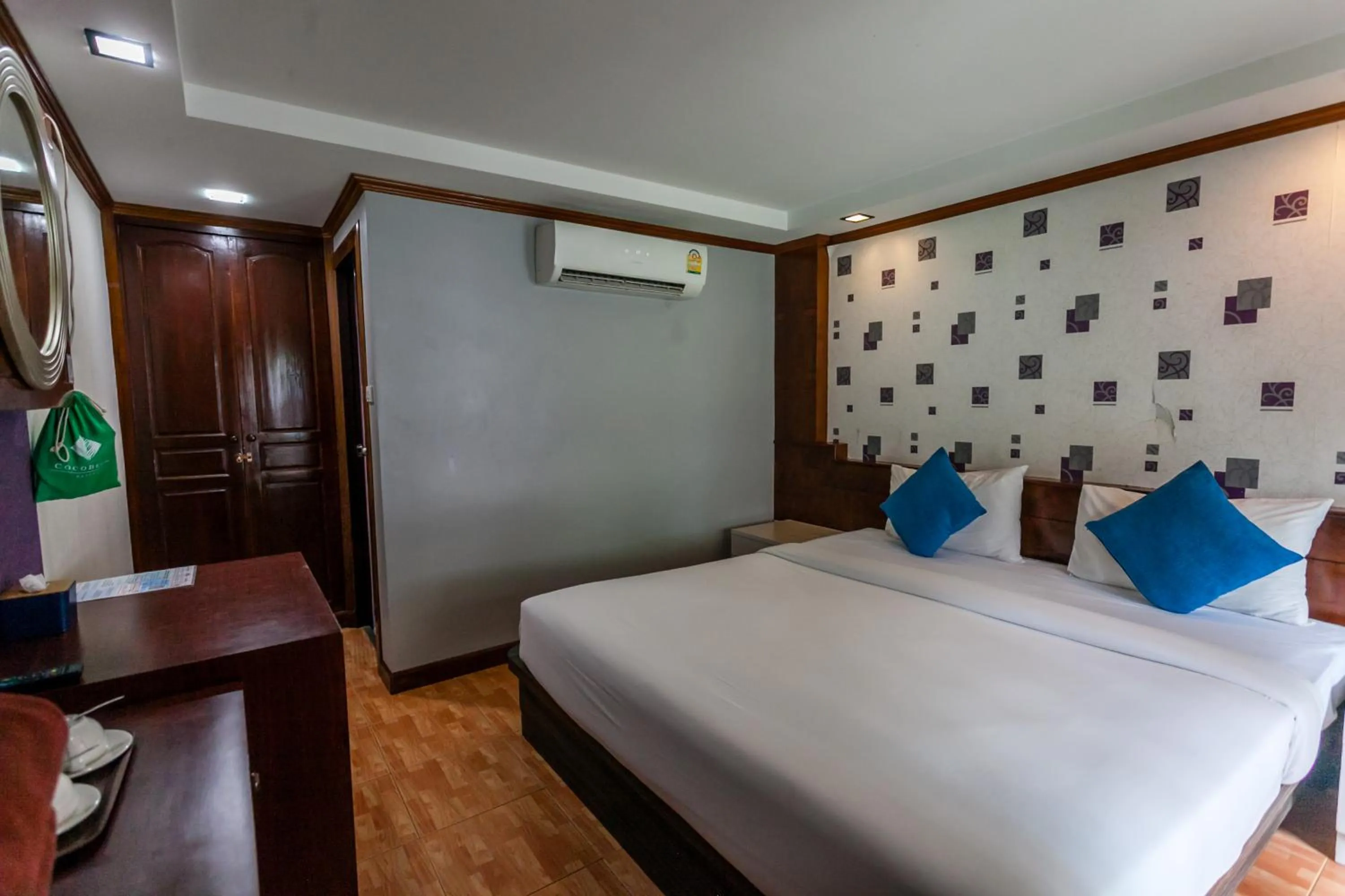 Bed in Coco Bella Hotel