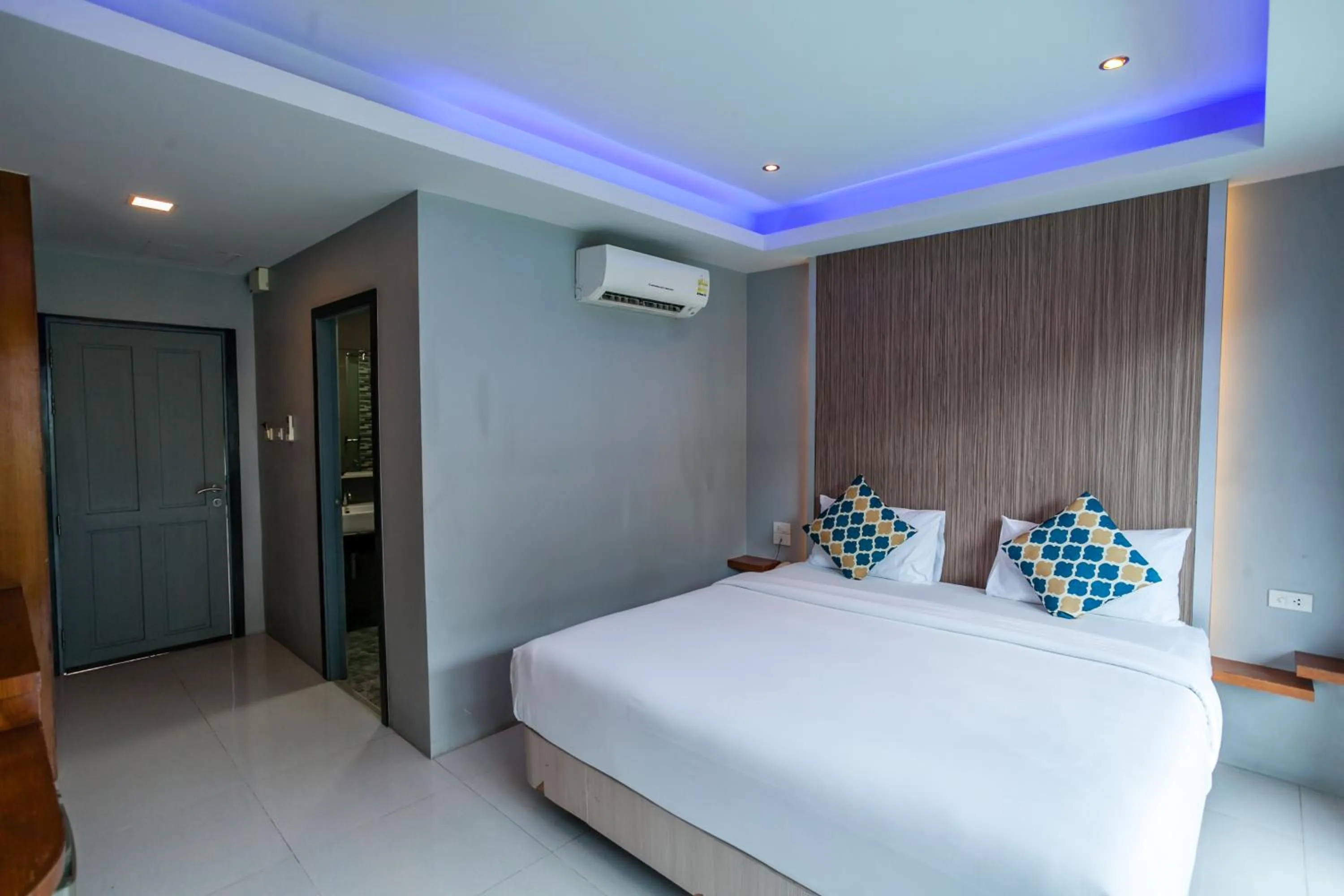 Bed in Coco Bella Hotel