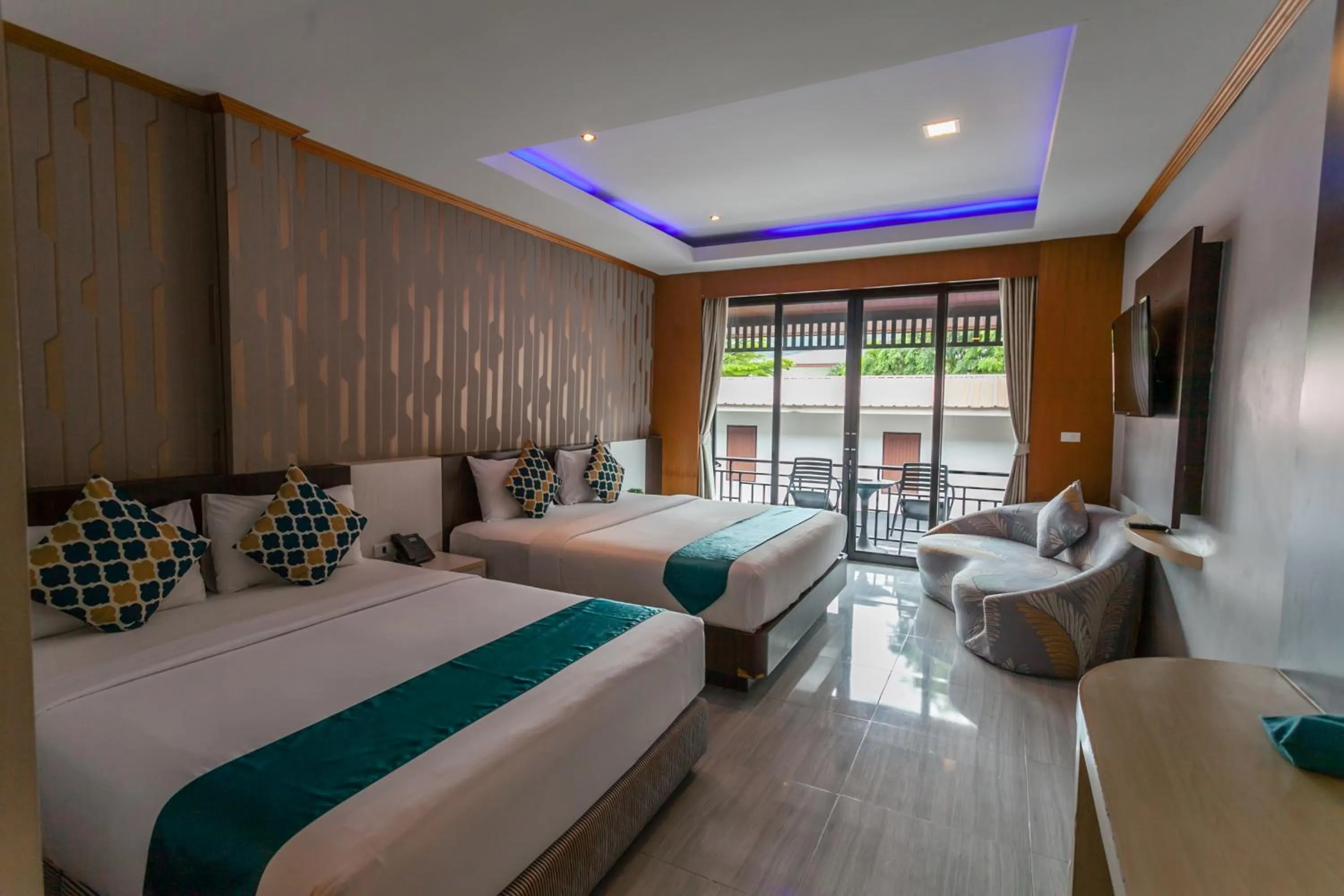 Bed in Coco Bella Hotel