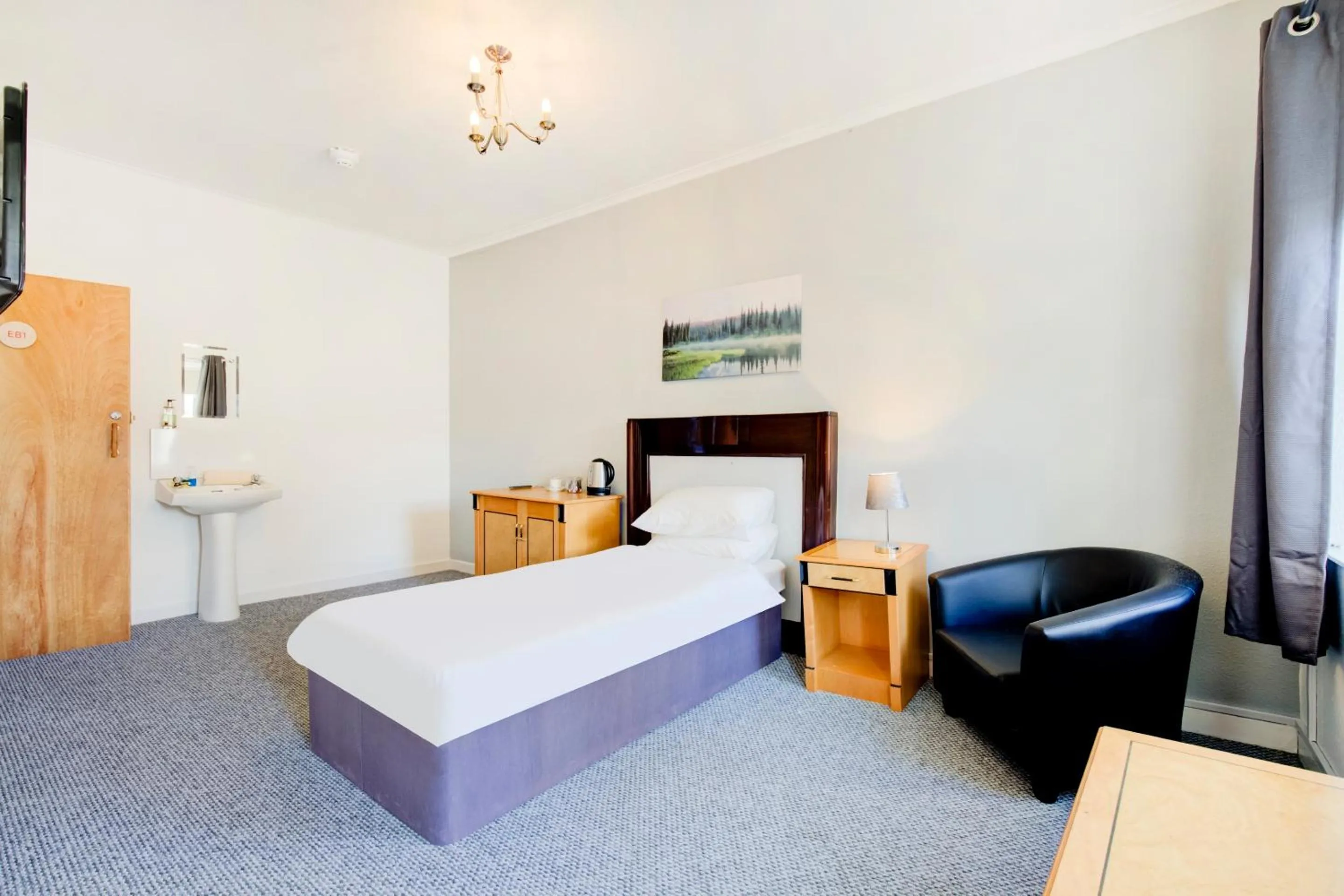 Bed in OYO Eastbank Hotel, Speyside Scotland