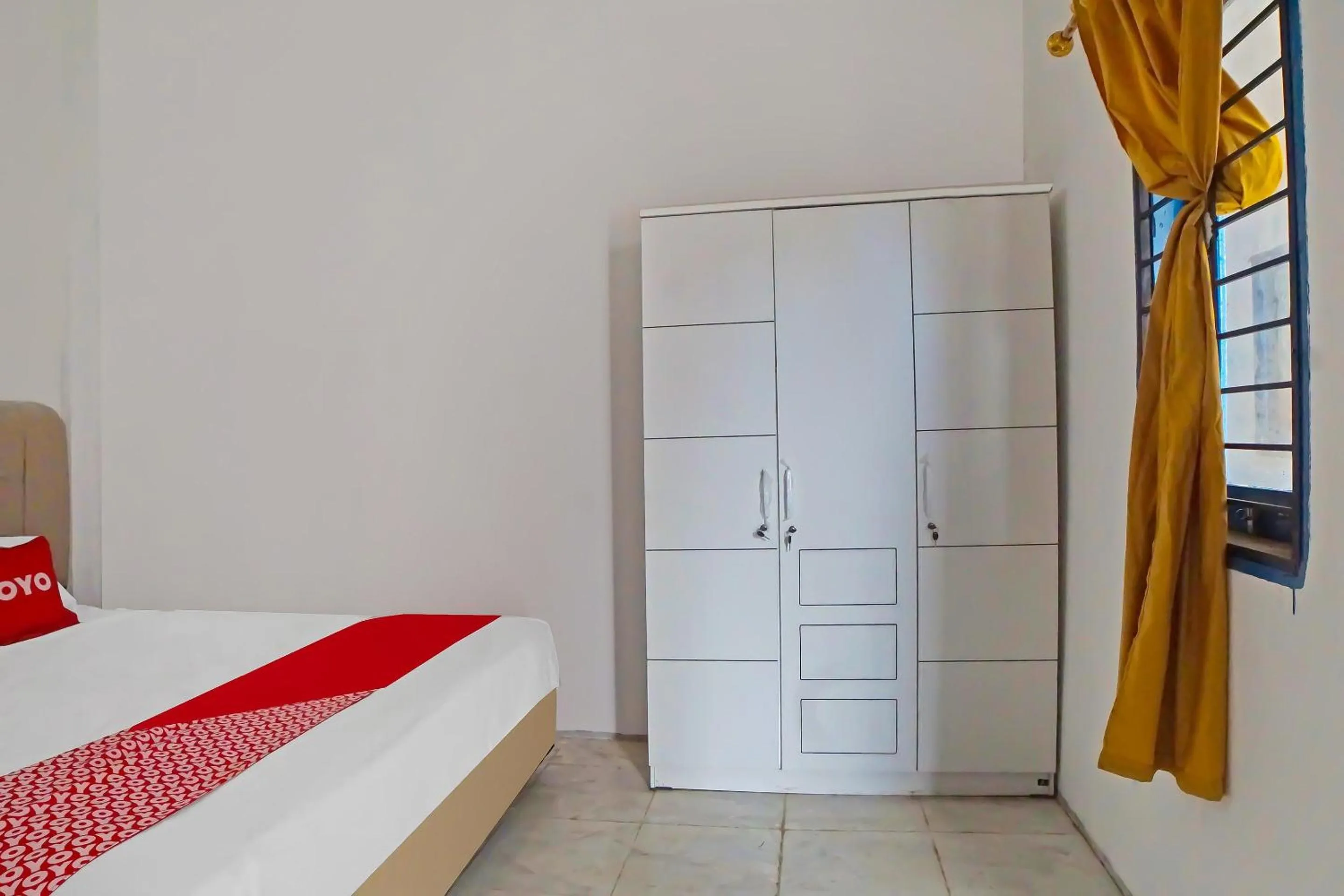 Bedroom in Hotel O Sri Ulina Homestay