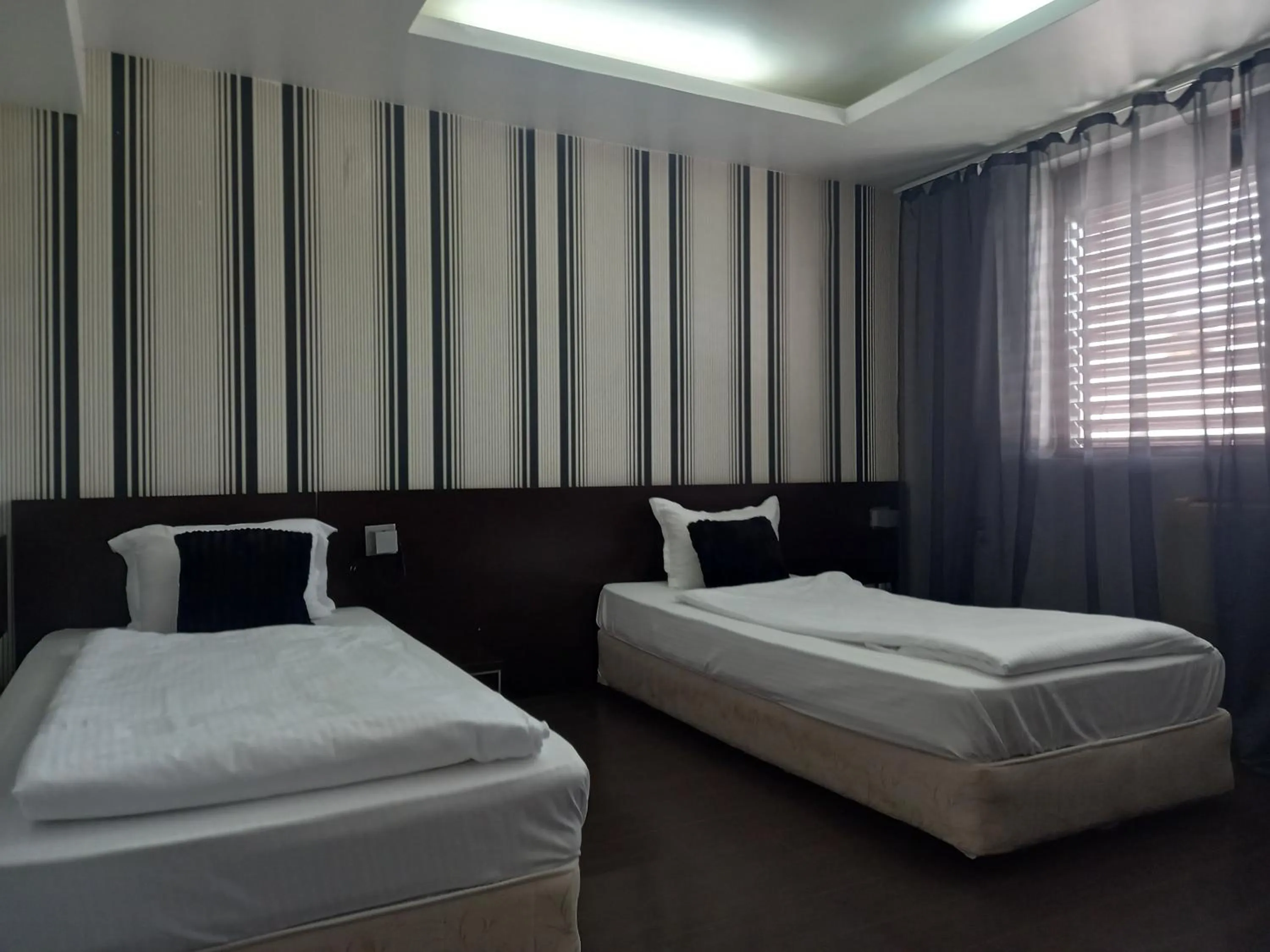 Garden view, Bed in Hotel Rio