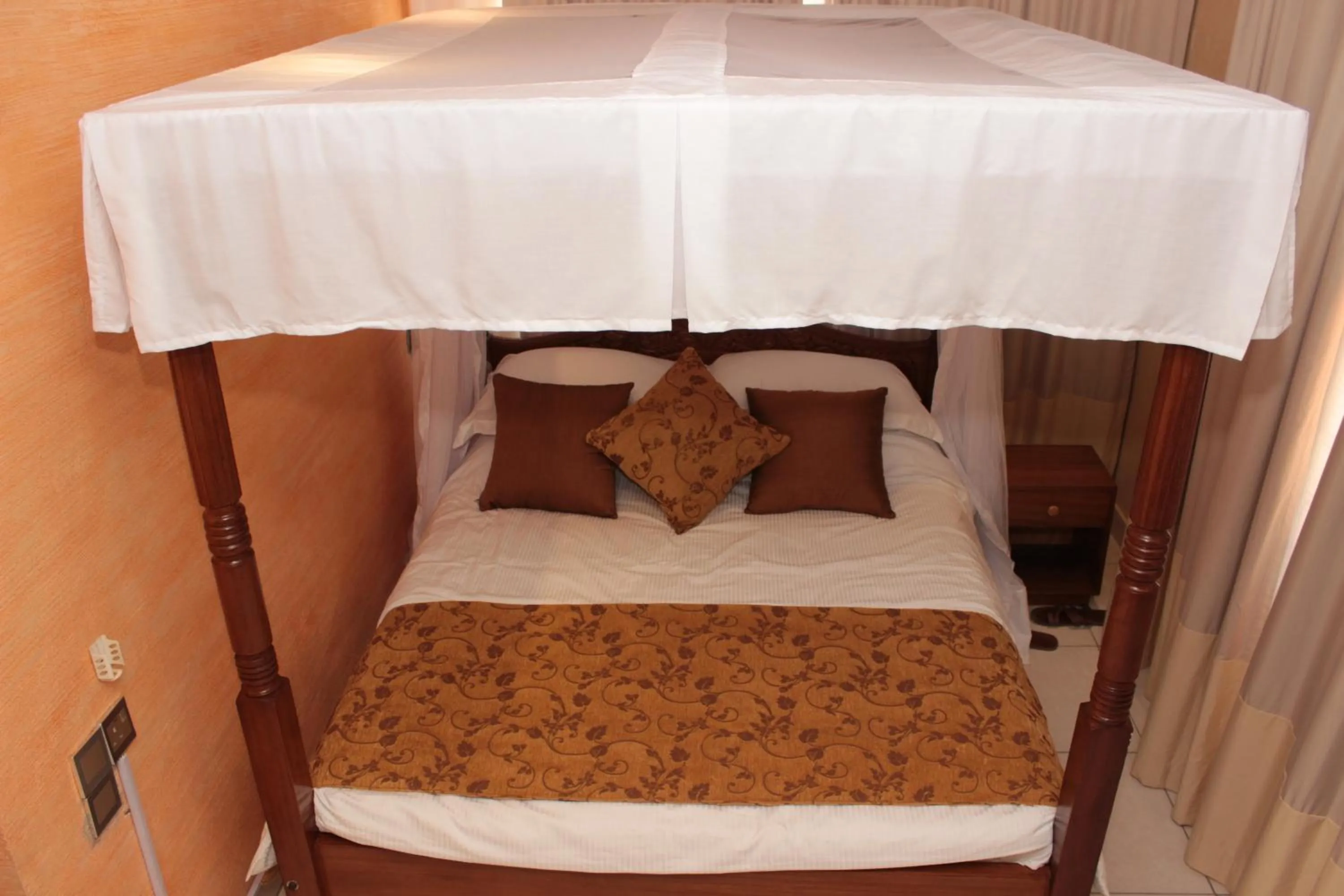 Bed in Moffat Court Boutique Hotel