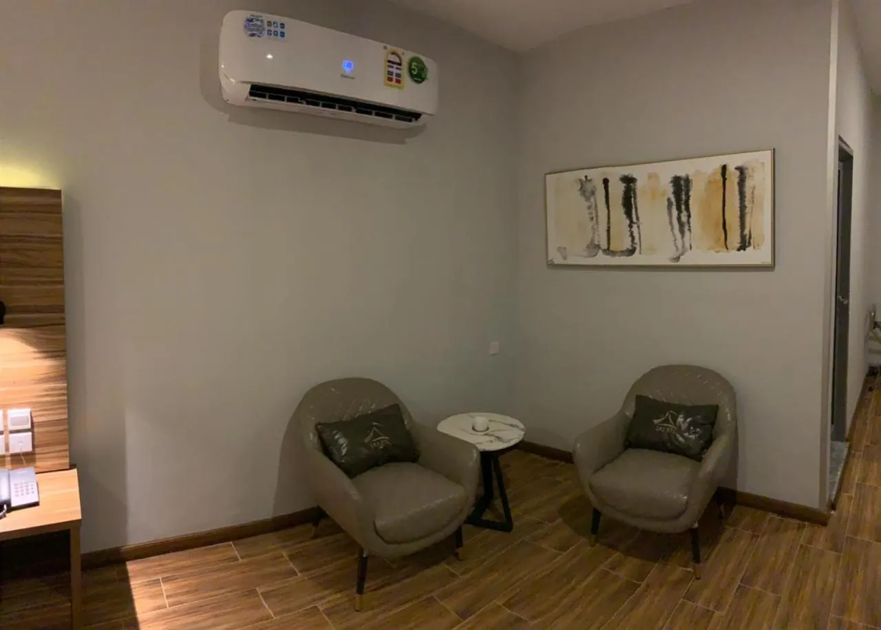 Seating area in ساس رتل للوحدات السكنية المفروشة