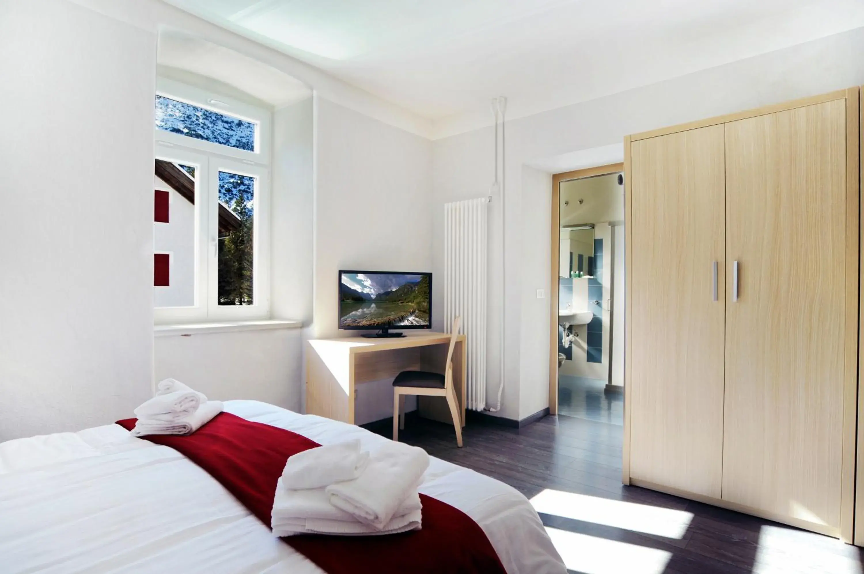 Quadruple Room in Hotel Croda Rossa Quadruple Room in Hotel Croda Rossa