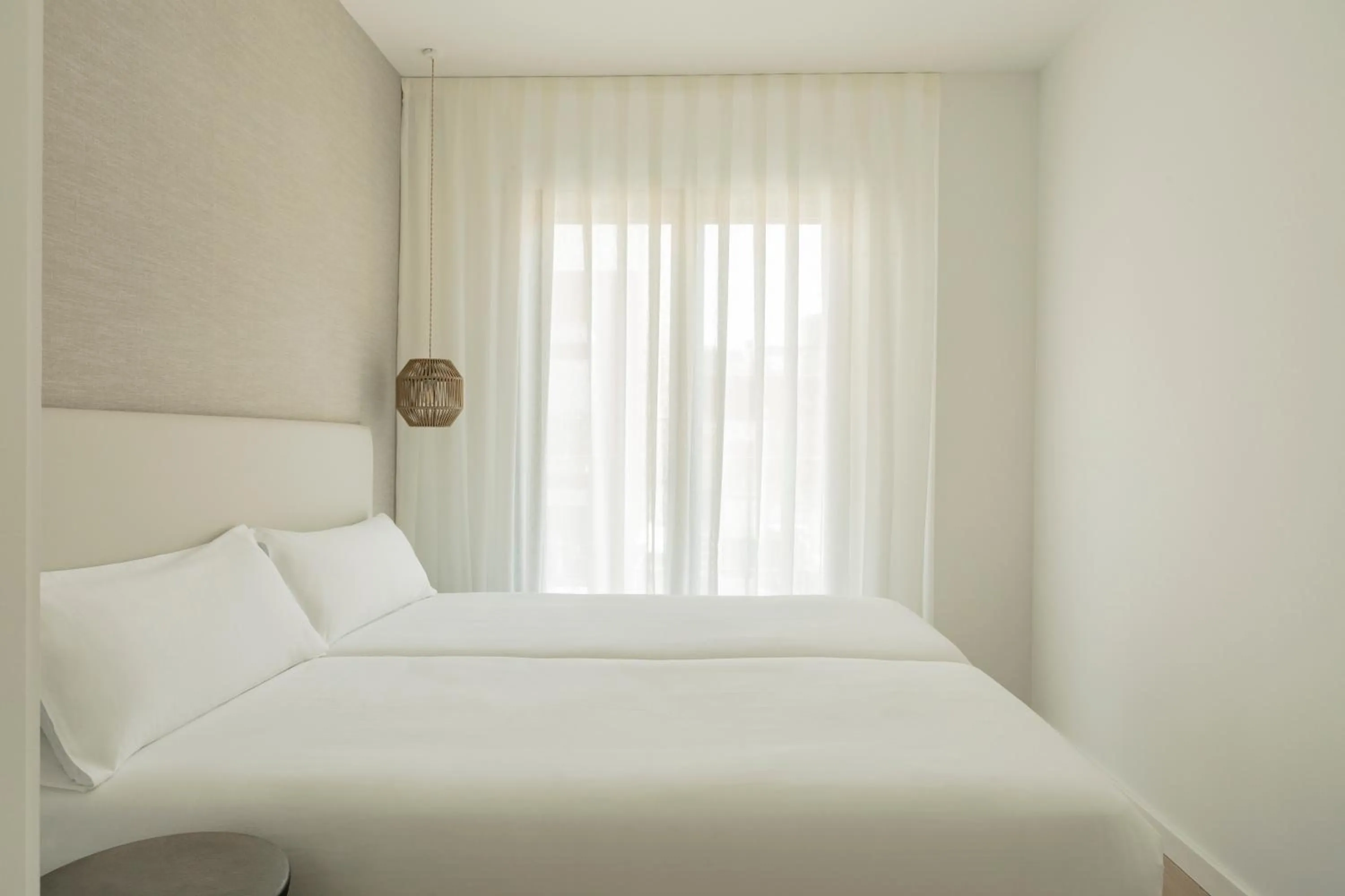 Bed in Europa Apartments