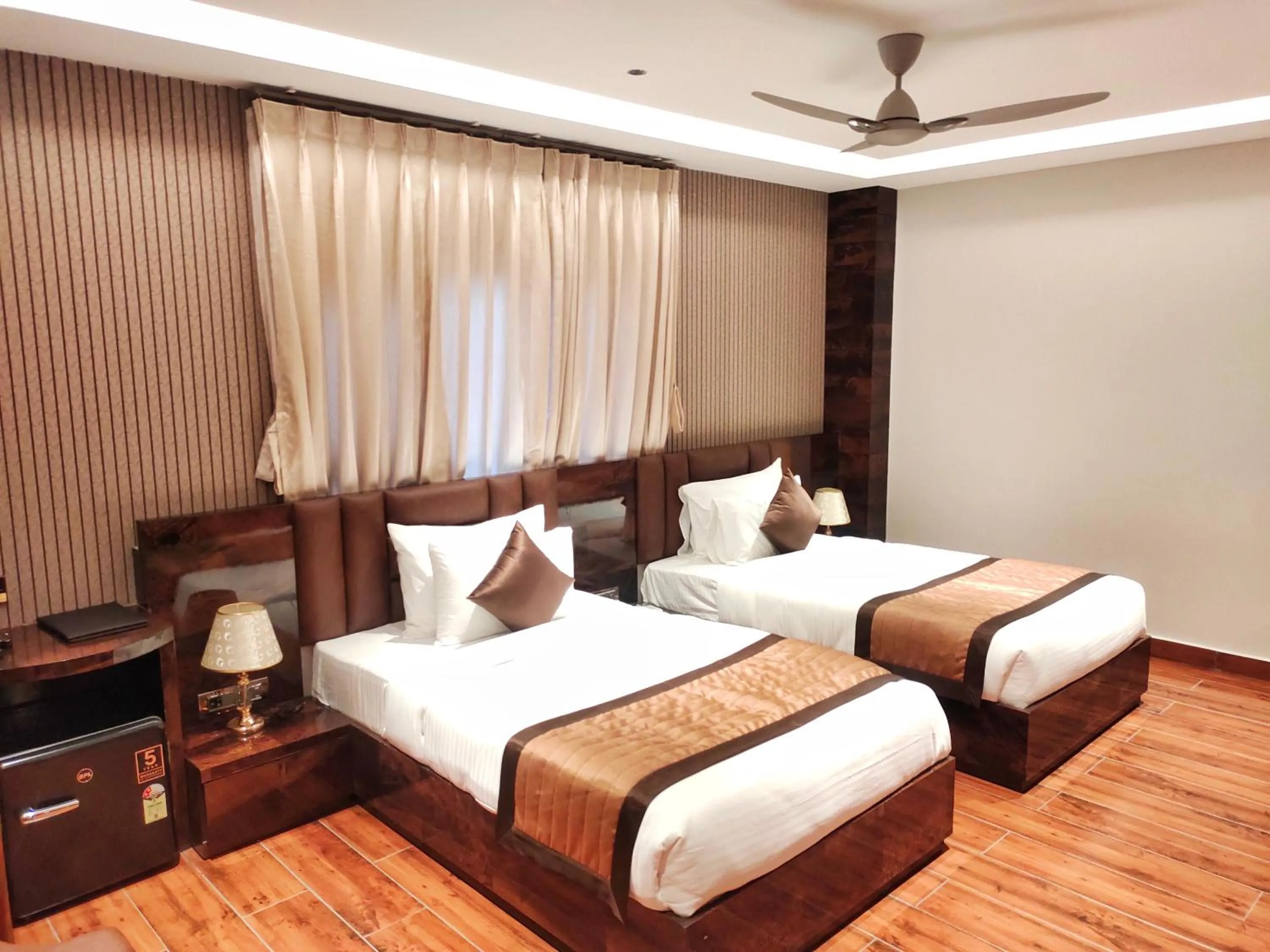 Bed in HOTEL SUNCITY PALACE