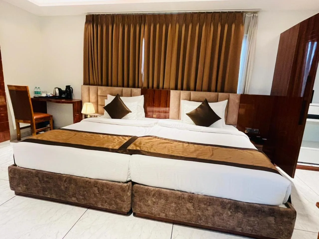 Bed in HOTEL SUNCITY PALACE