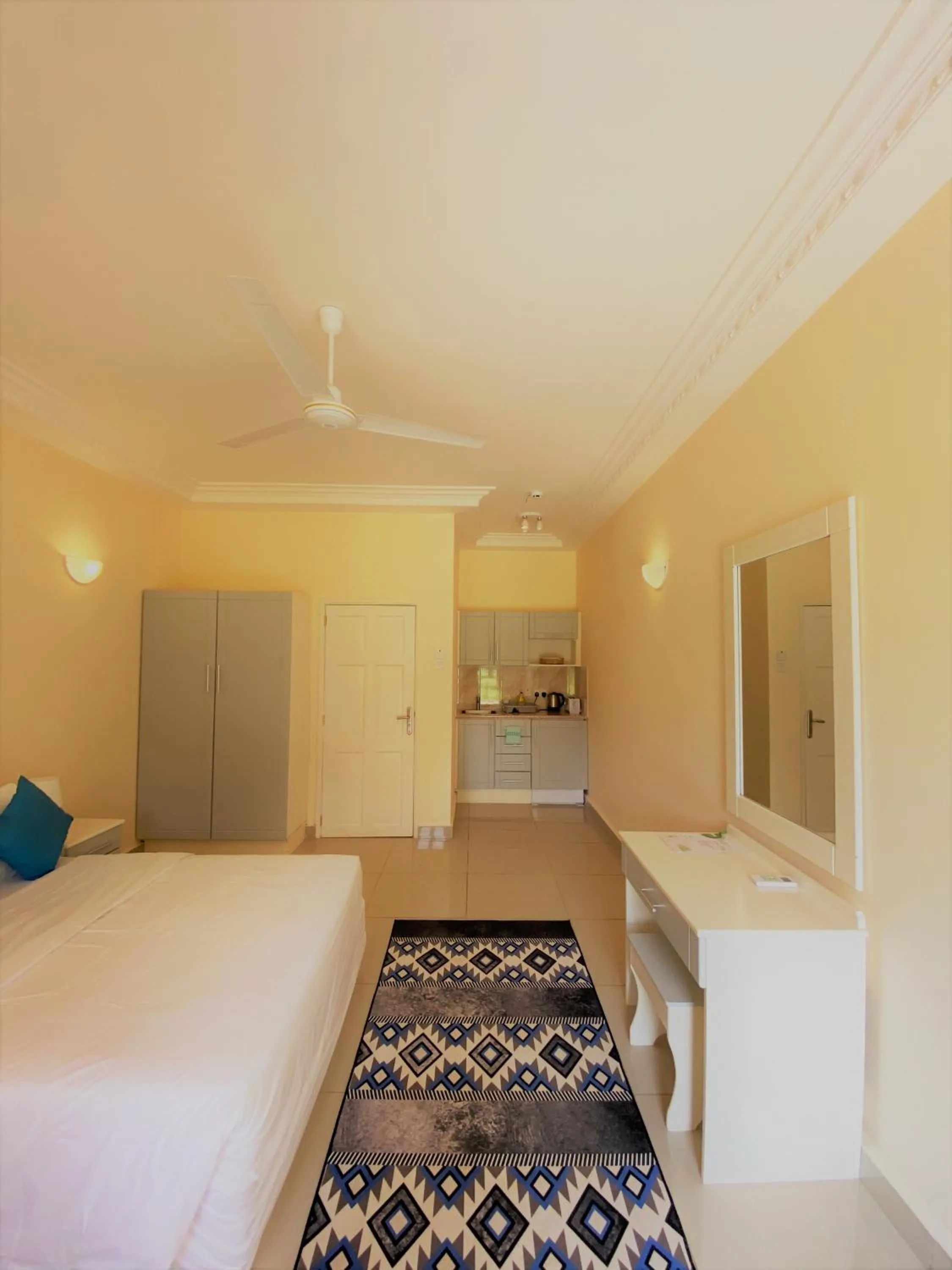 Kitchen or kitchenette, Bed in Kololi Beach Resort