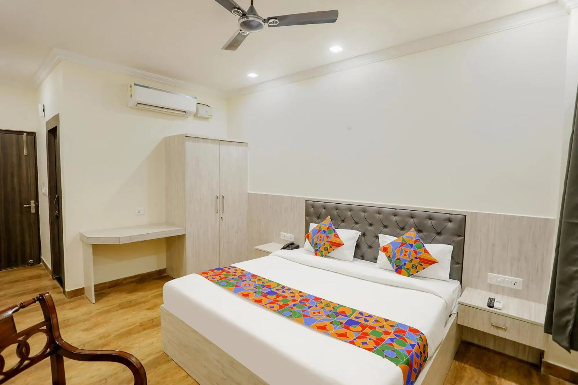 Photo of the whole room, Bed in FabExpress Trijal Inn