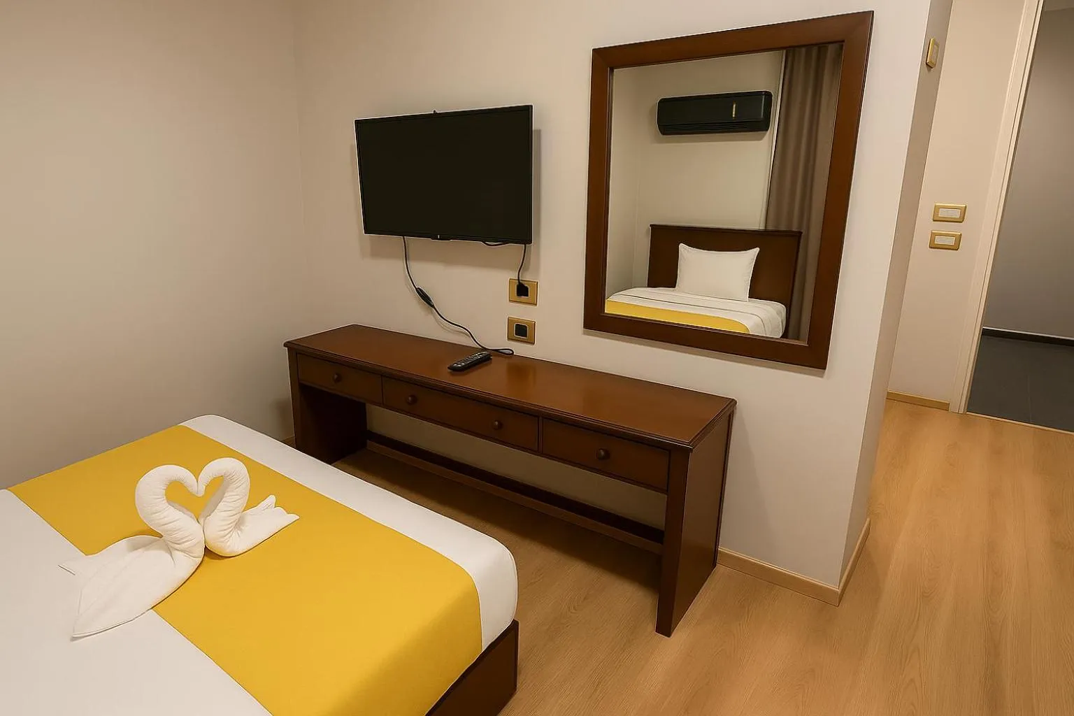 Bed in Miramar Evergreen Hotel