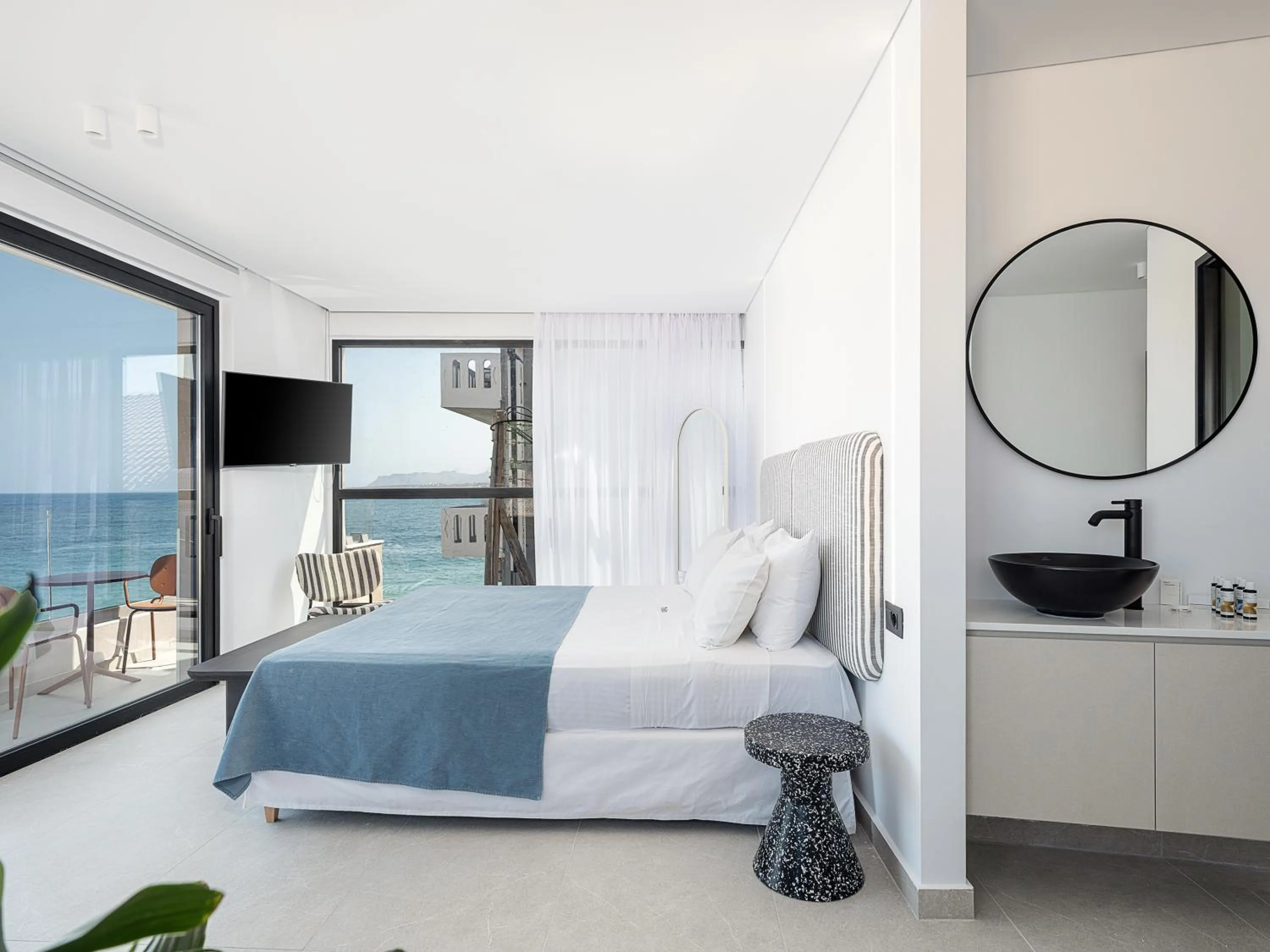 Bed in Theta Boutique Hotel