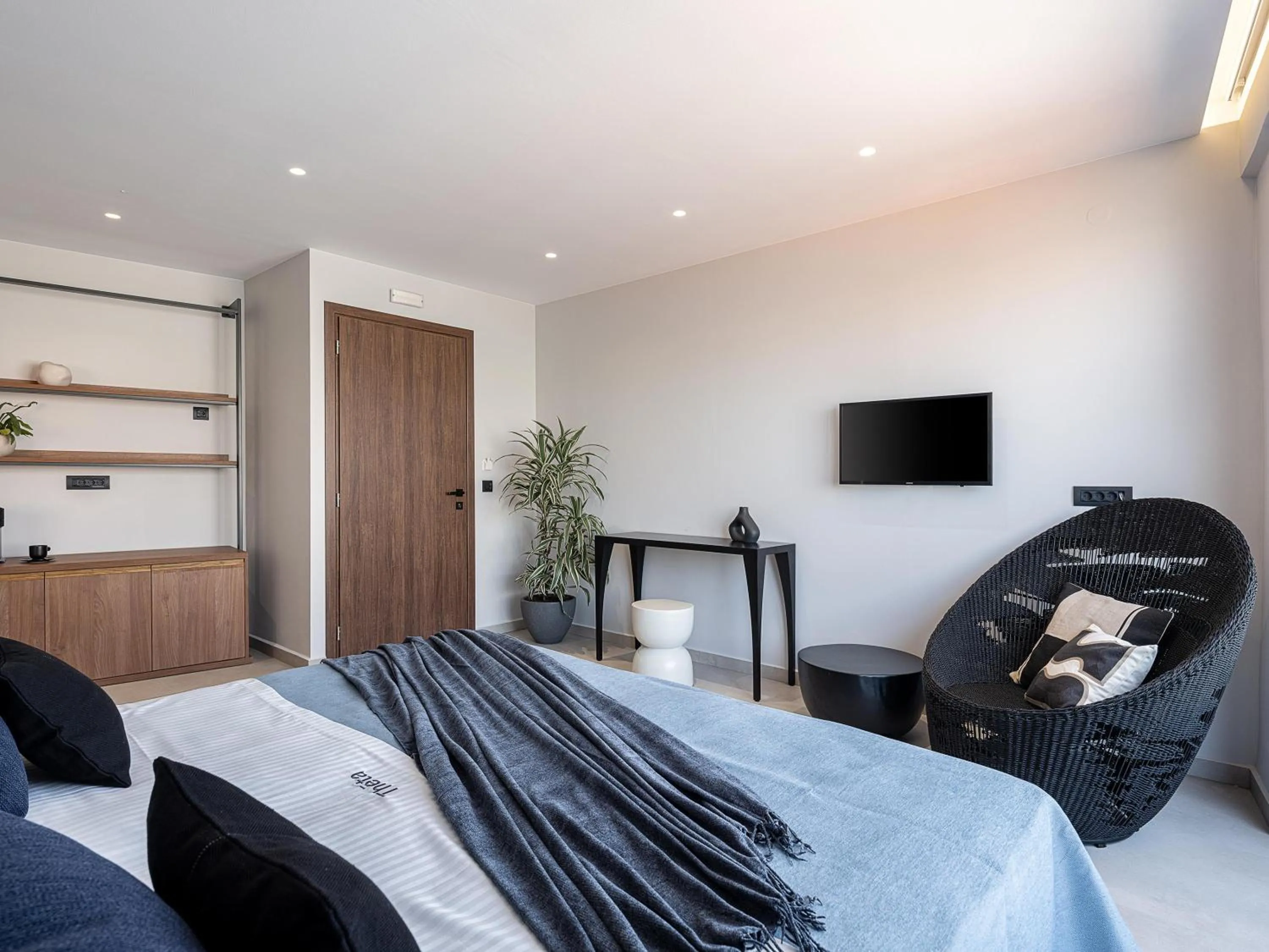 Bed in Theta Boutique Hotel