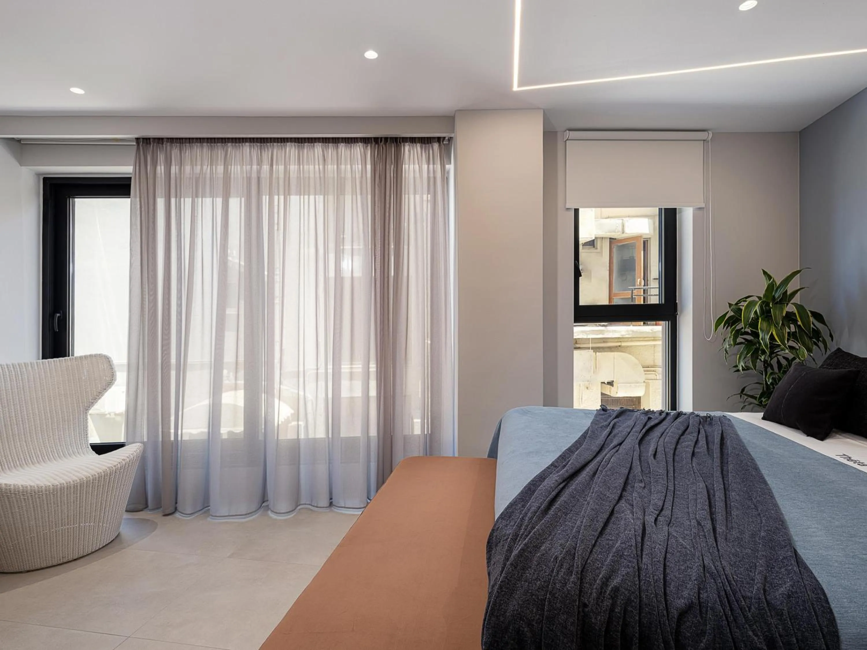 Bed in Theta Boutique Hotel