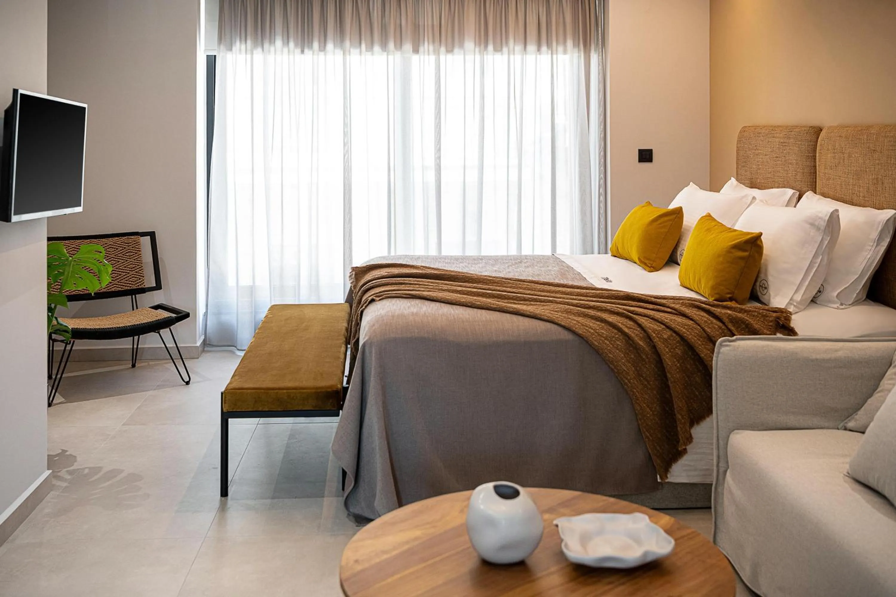 Bed in Theta Boutique Hotel