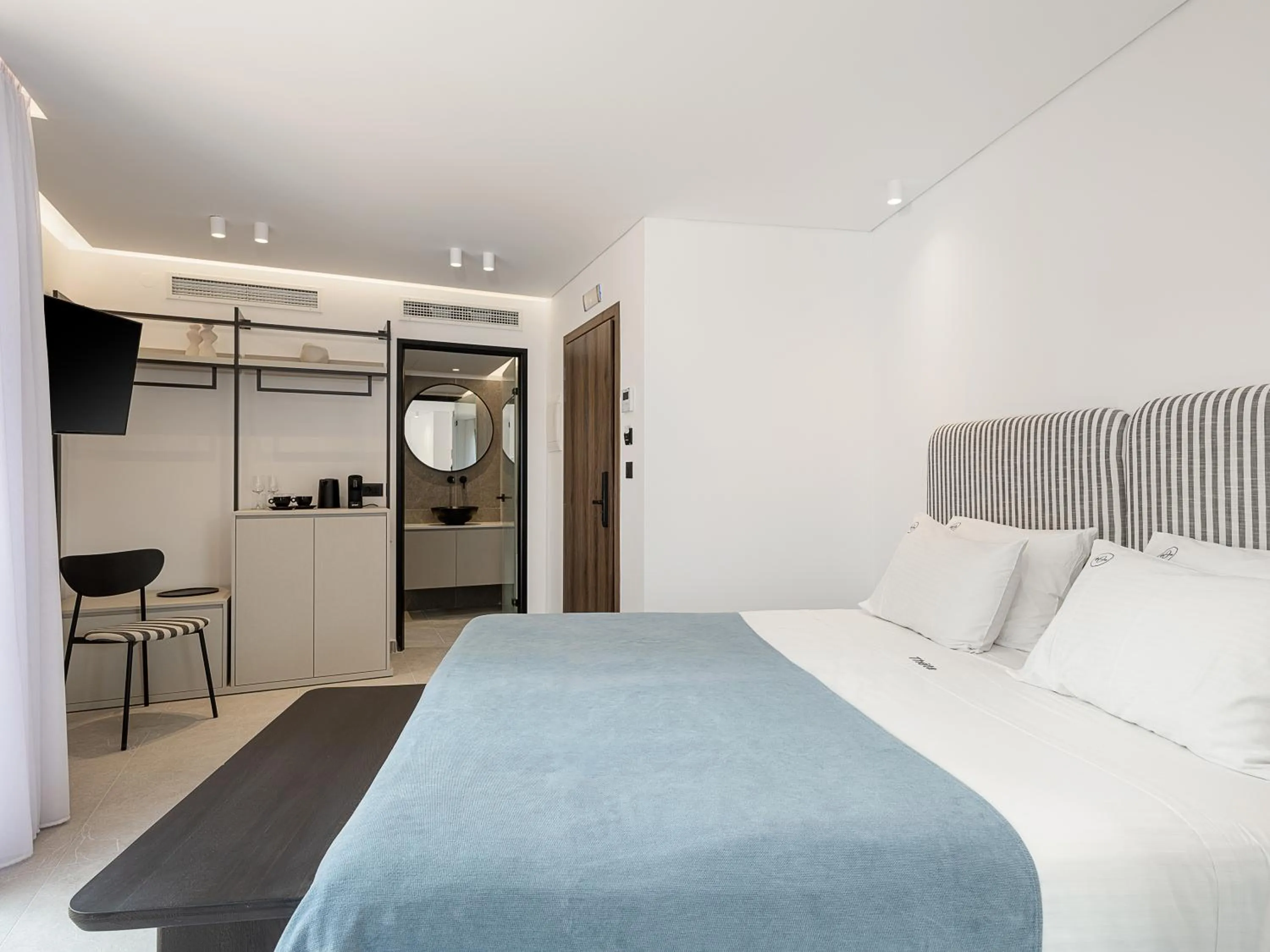 Bed in Theta Boutique Hotel