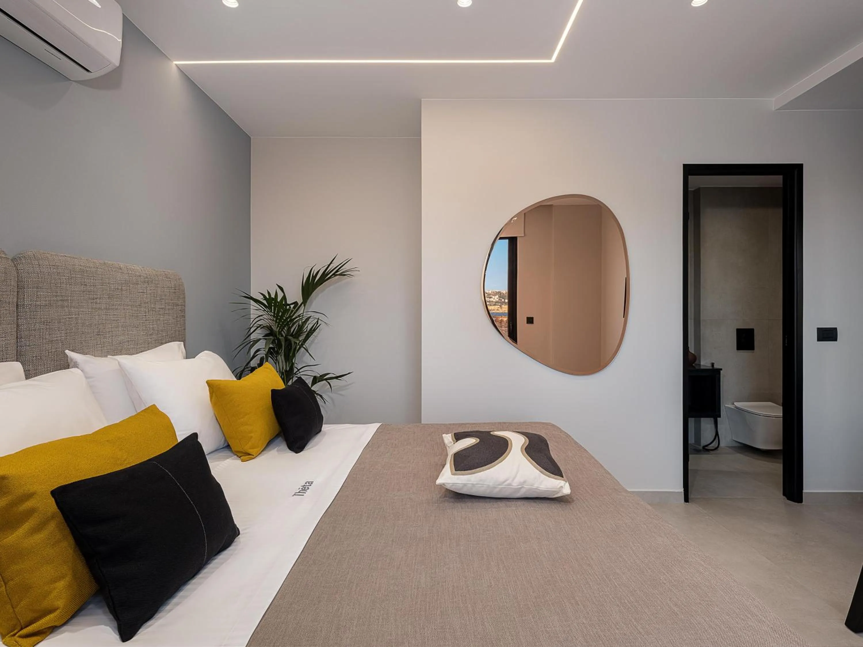 Bed in Theta Boutique Hotel