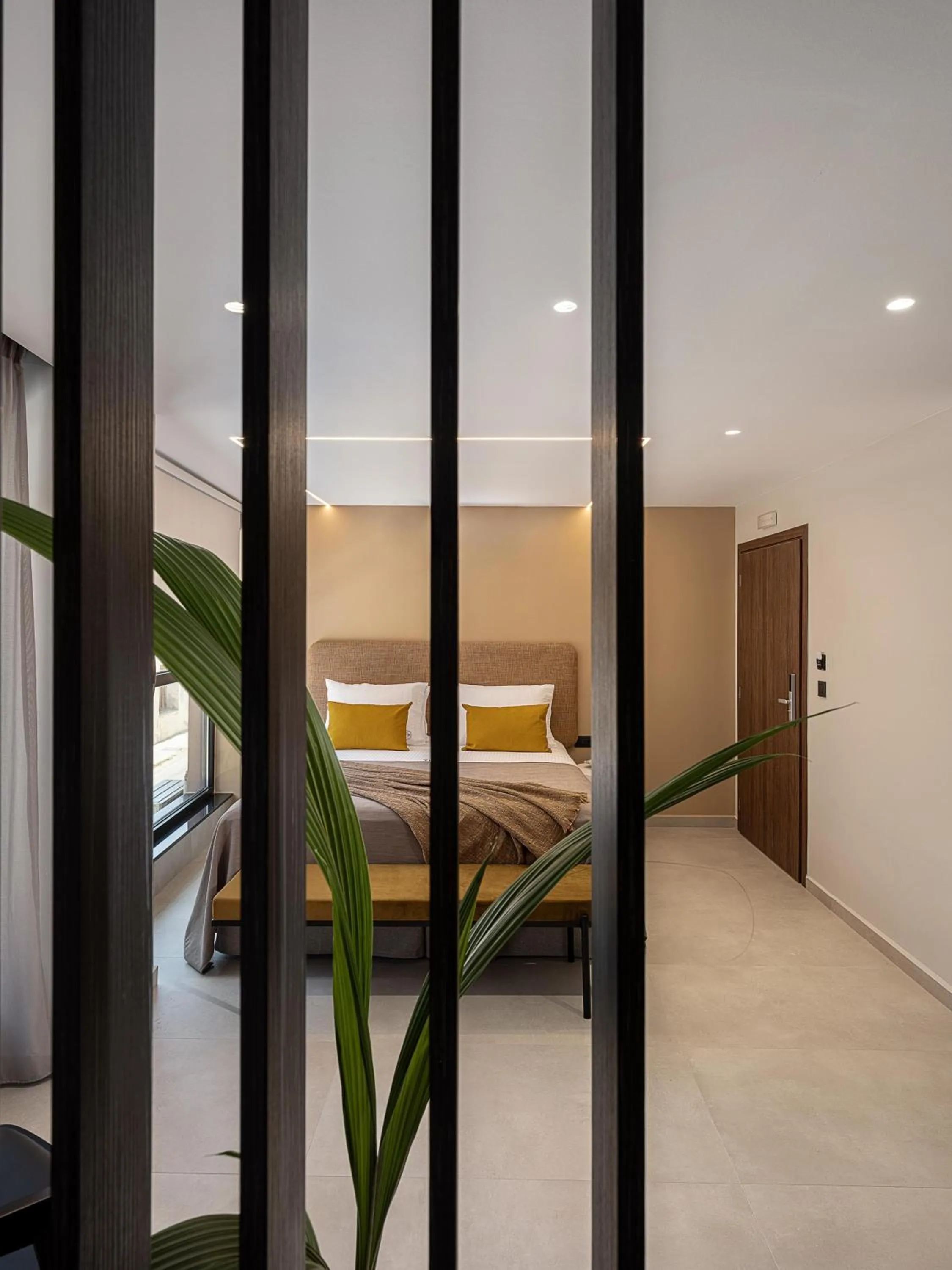 Bed in Theta Boutique Hotel