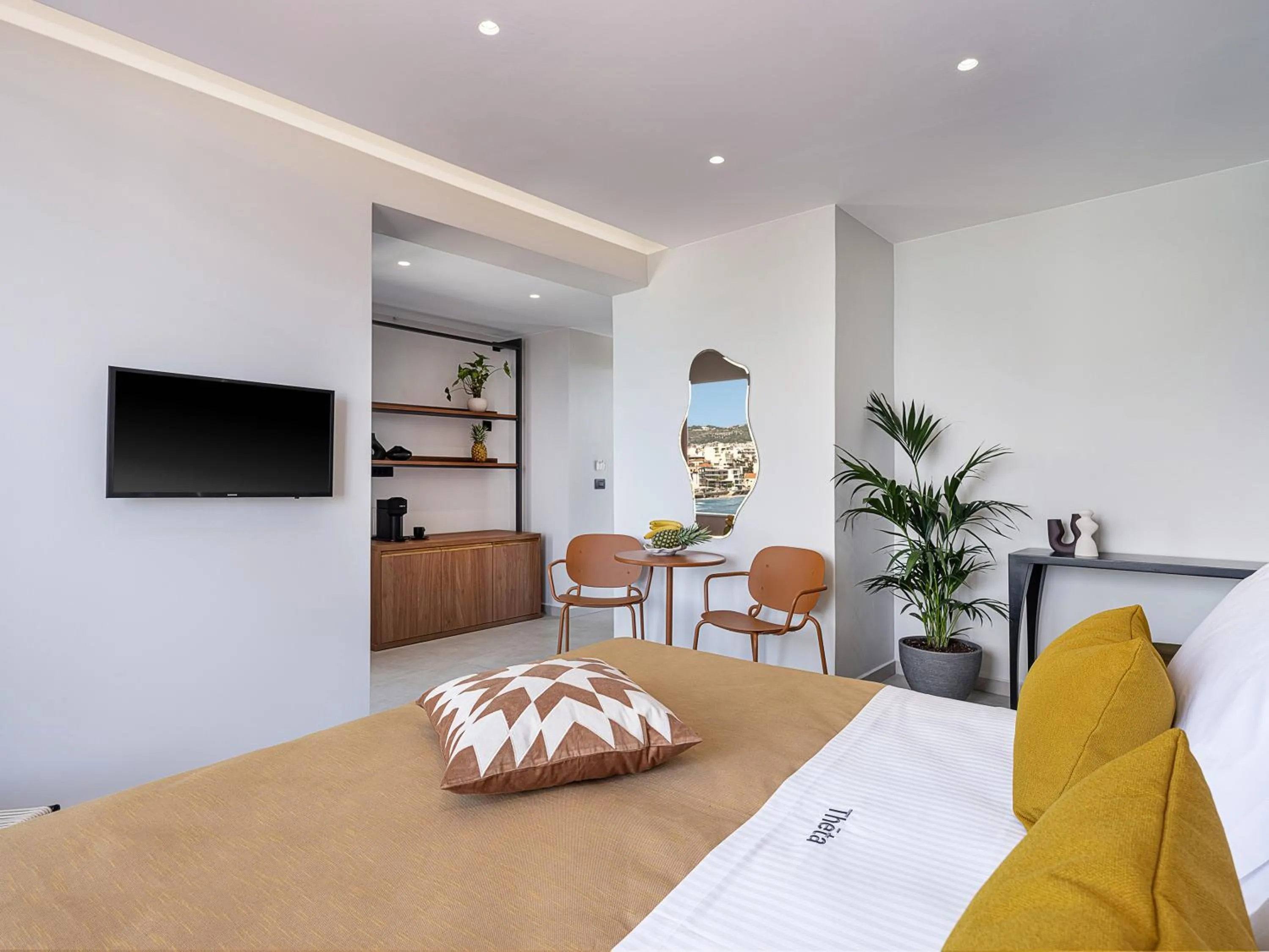 Bed in Theta Boutique Hotel