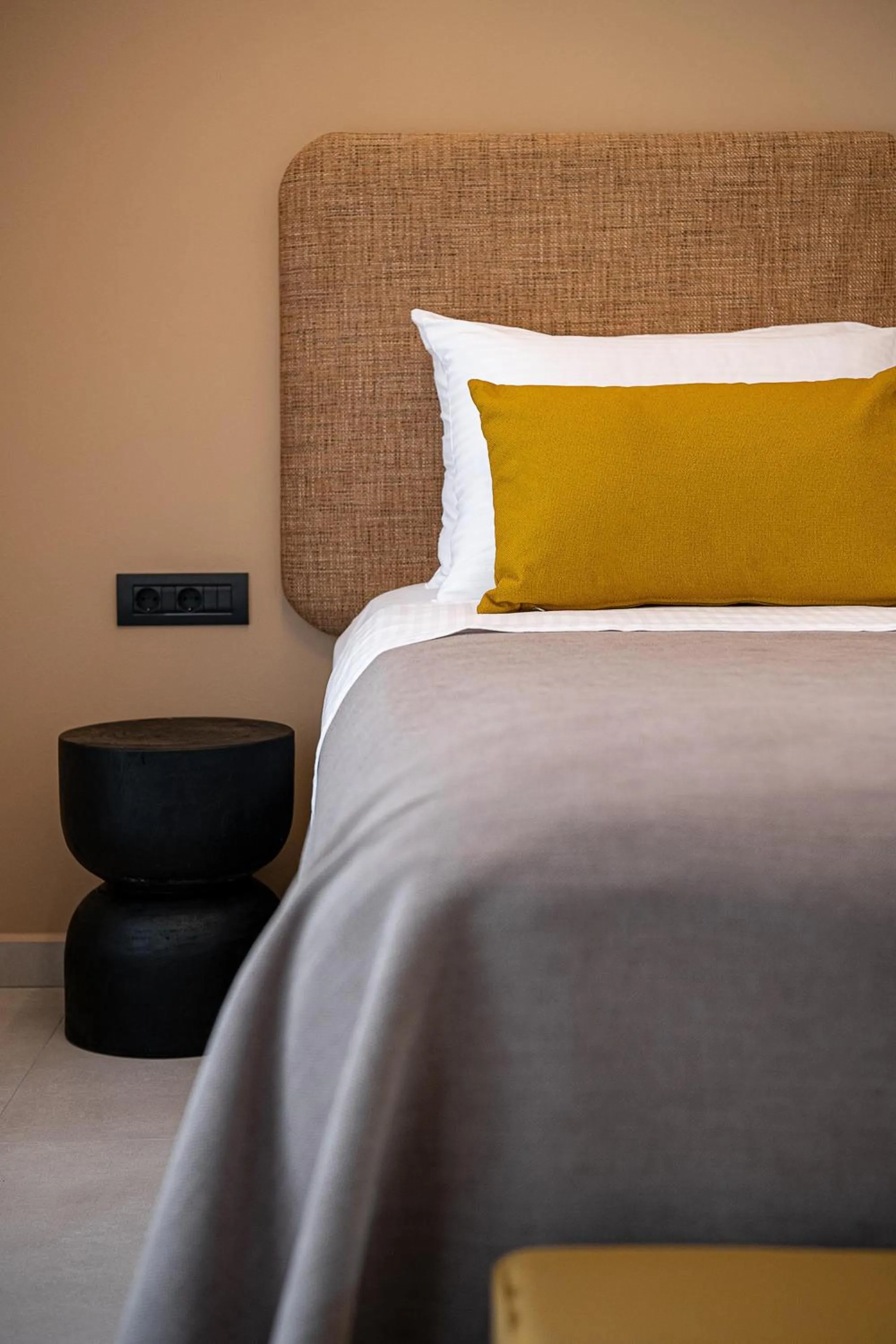 Bed in Theta Boutique Hotel