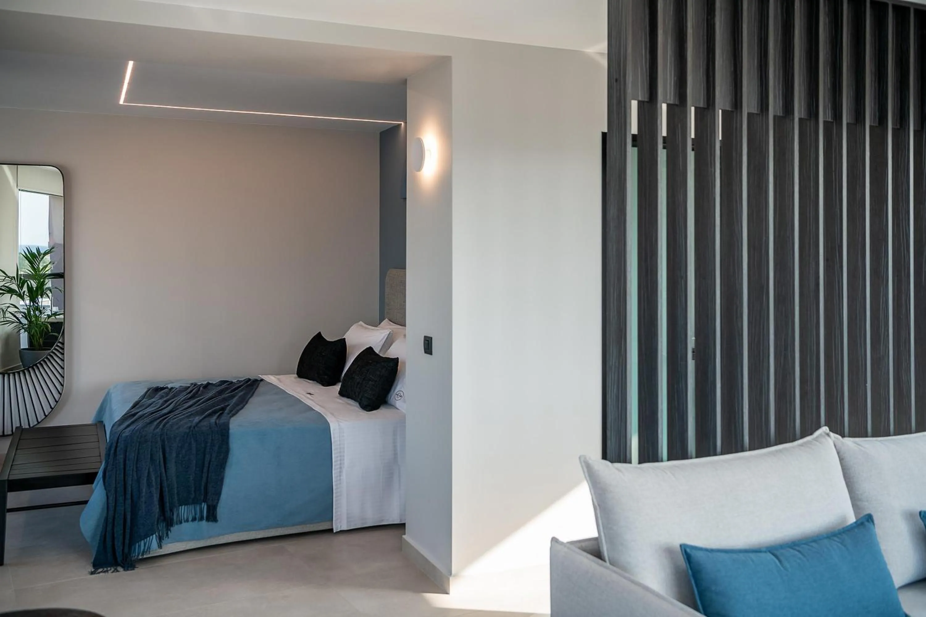 Bed in Theta Boutique Hotel