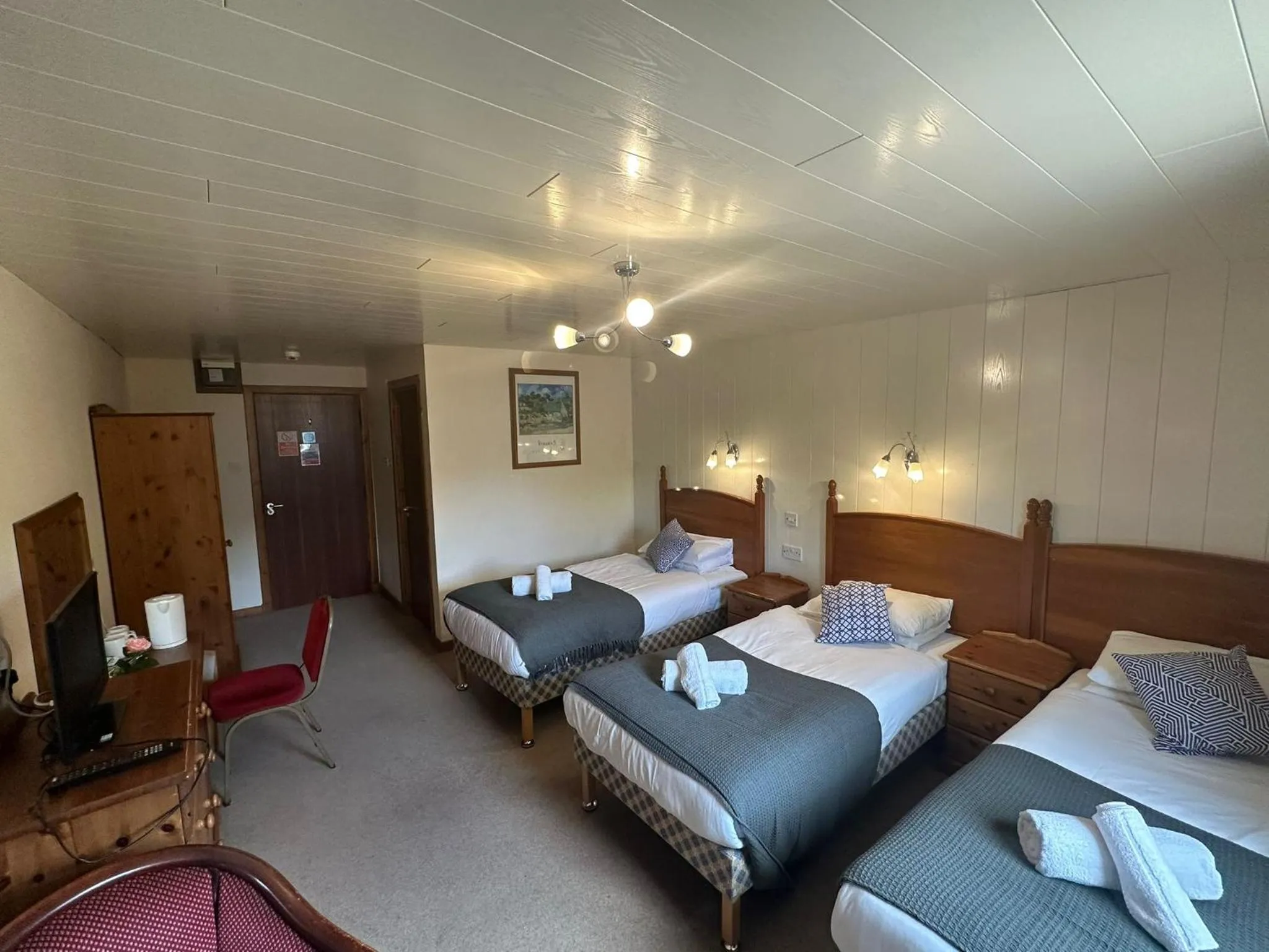 Bedroom in OYO Mackay's Travel Lodge Hotel