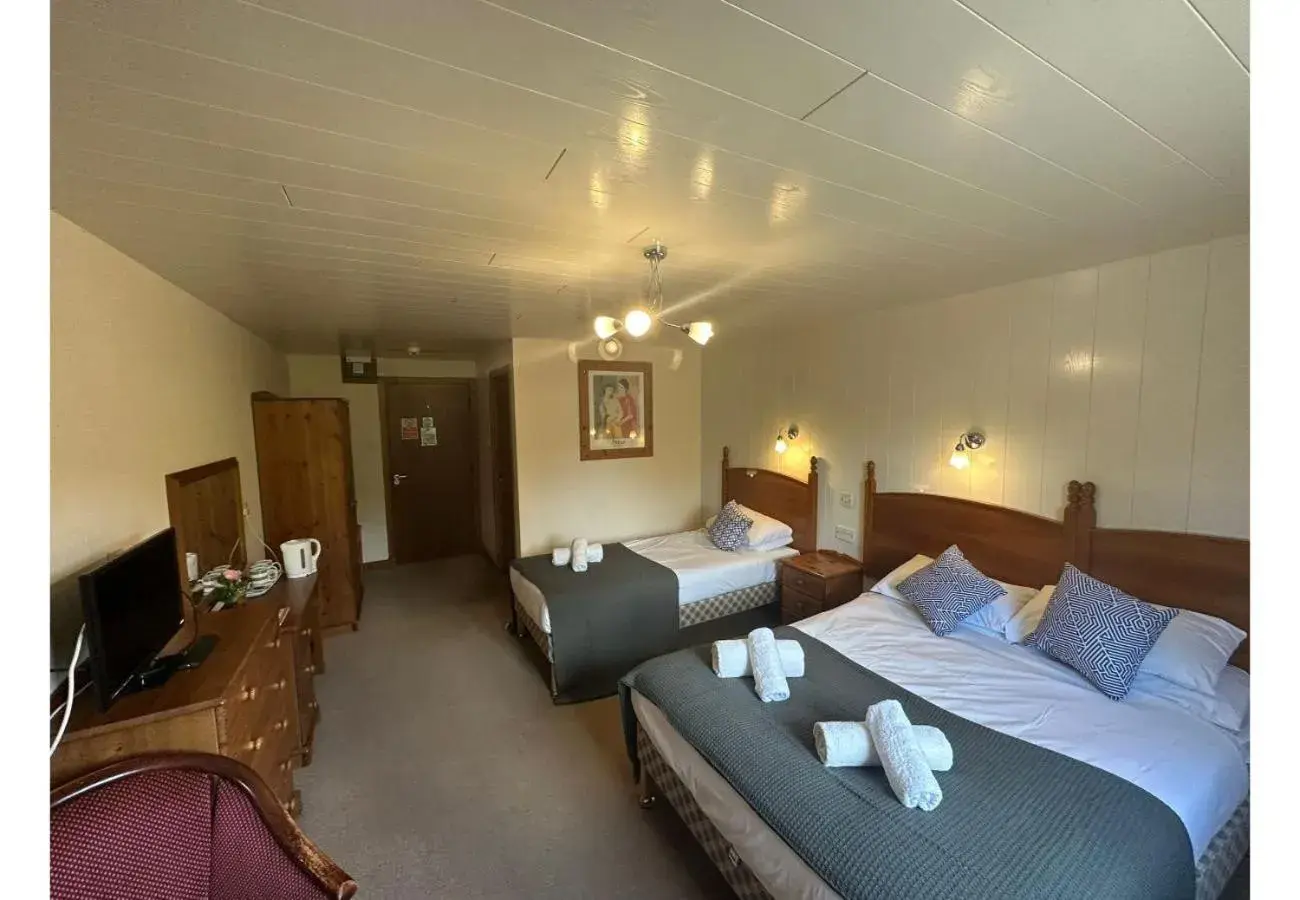 Standard Family Room in OYO Mackay's Travel Lodge Hotel Standard Family Room in OYO Mackay's Travel Lodge Hotel