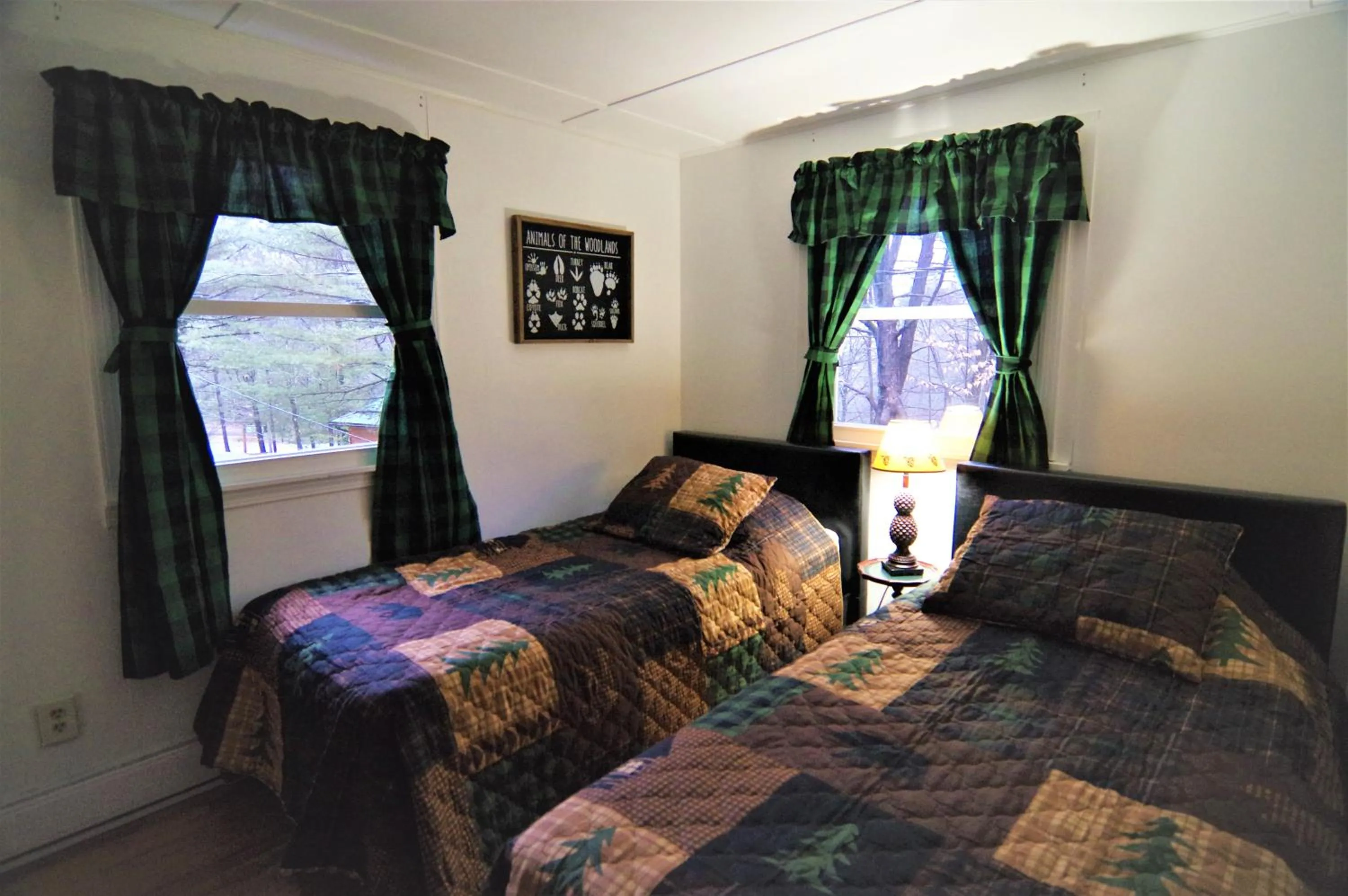 Bed in Adirondack Diamond Point Lodge