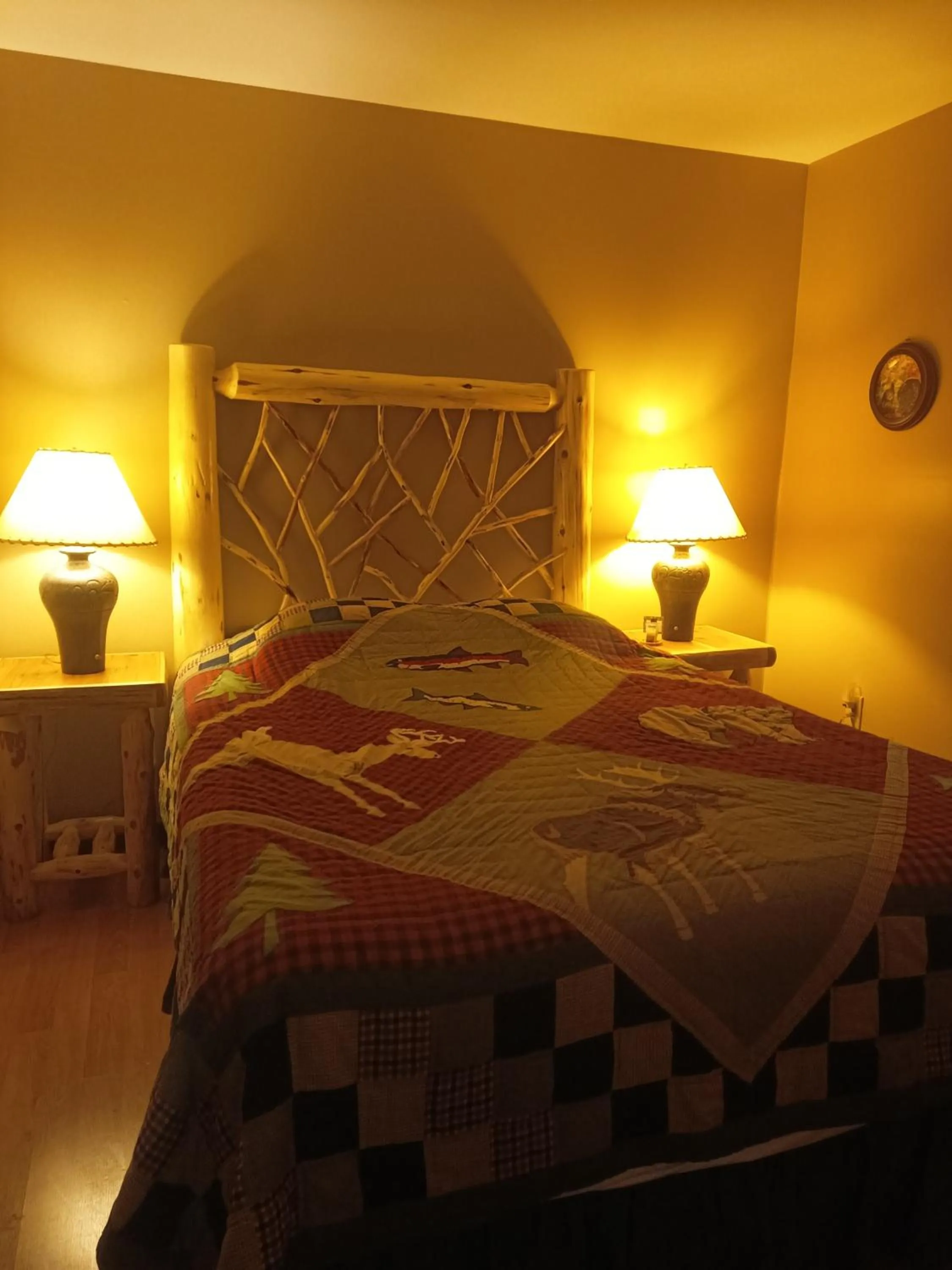 Bed in Adirondack Diamond Point Lodge