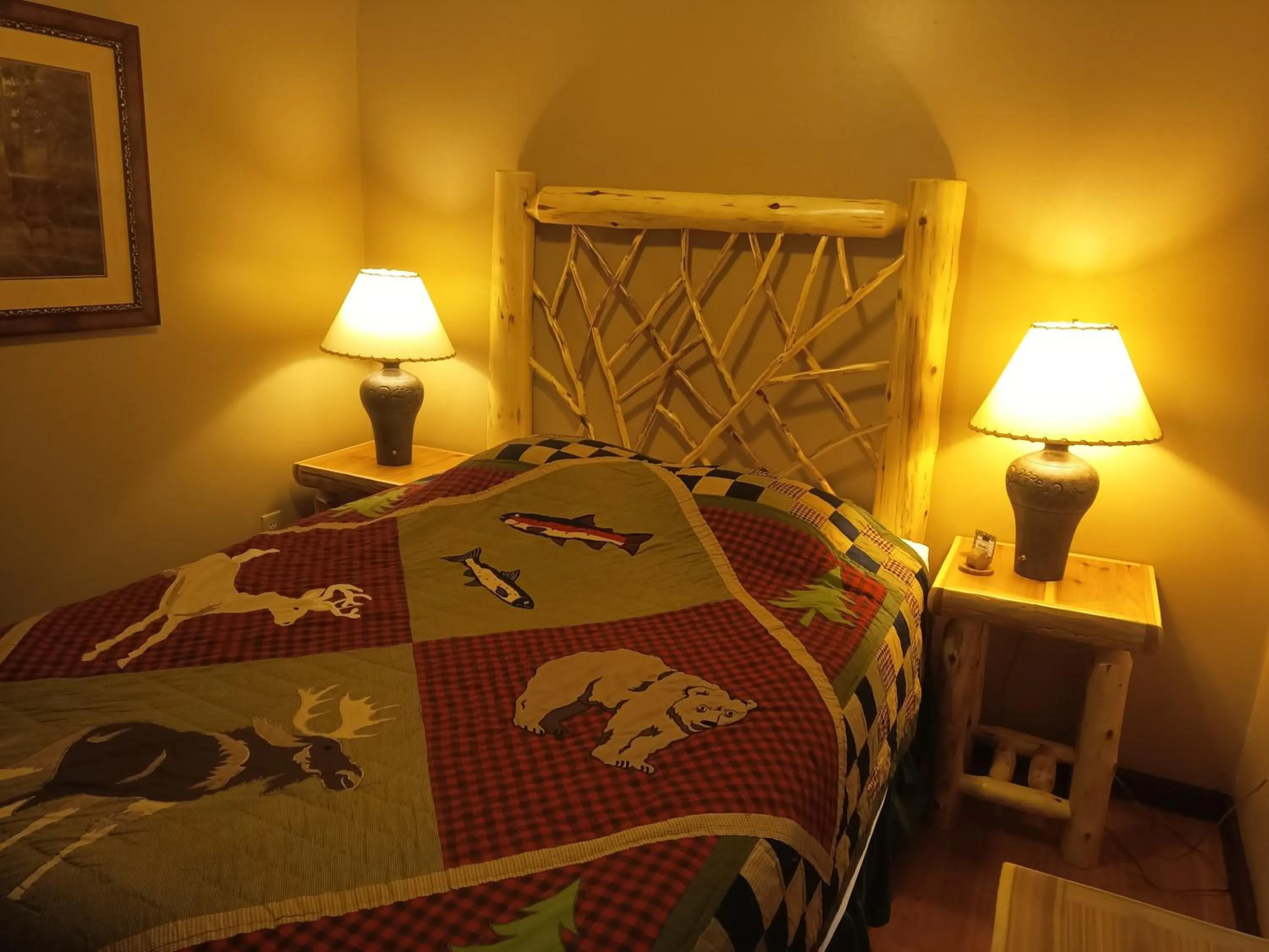 Bed in Adirondack Diamond Point Lodge