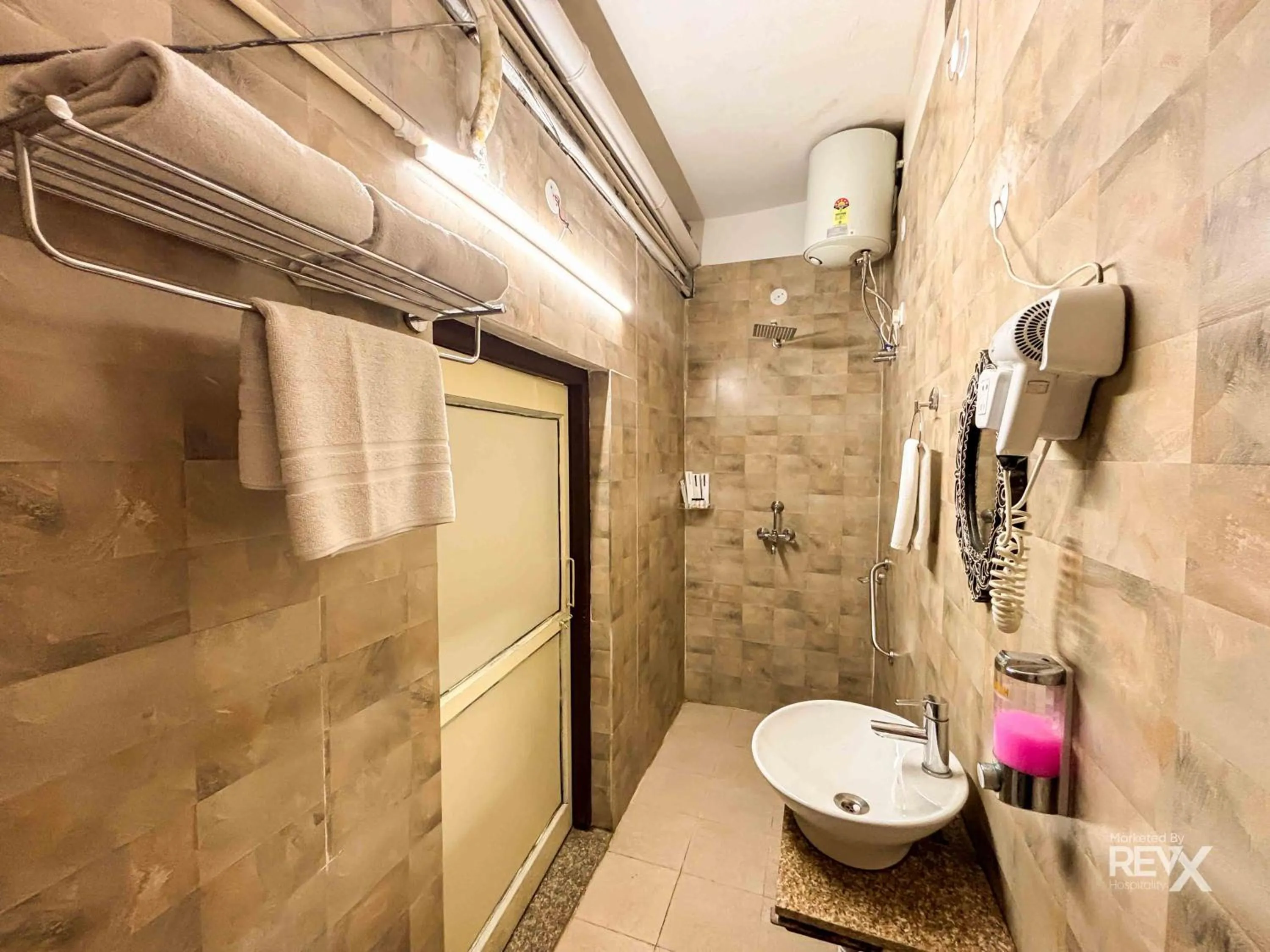 Shower in The Neeraj Naturecure - Ganga View