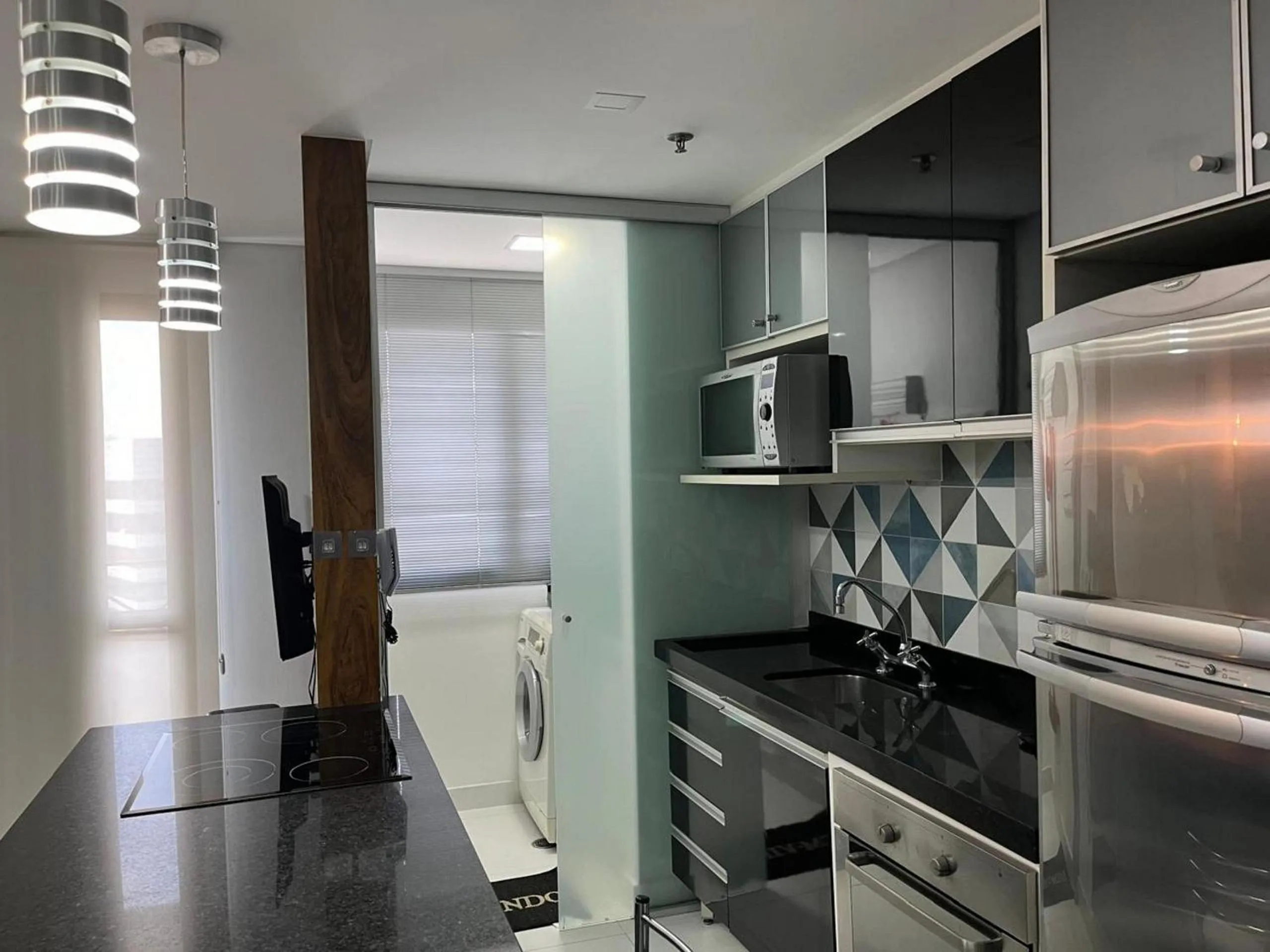 Kitchen or kitchenette in Elegance Suítes Alvorada