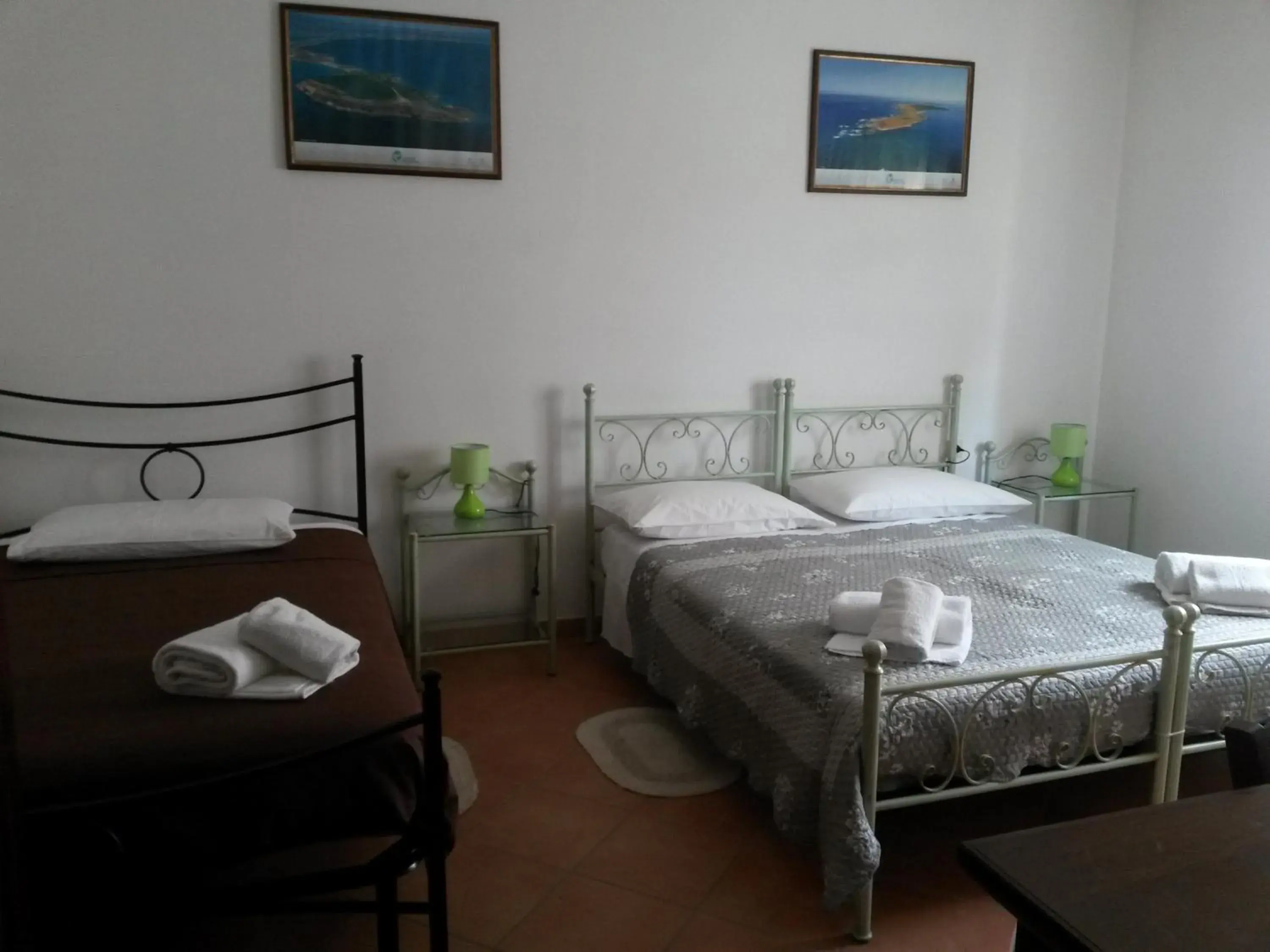 Family Room (2 Adults + 2 Children) in Affittacamere Le Statue Del Sinis Family Room (2 Adults + 2 Children) in Affittacamere Le Statue Del Sinis