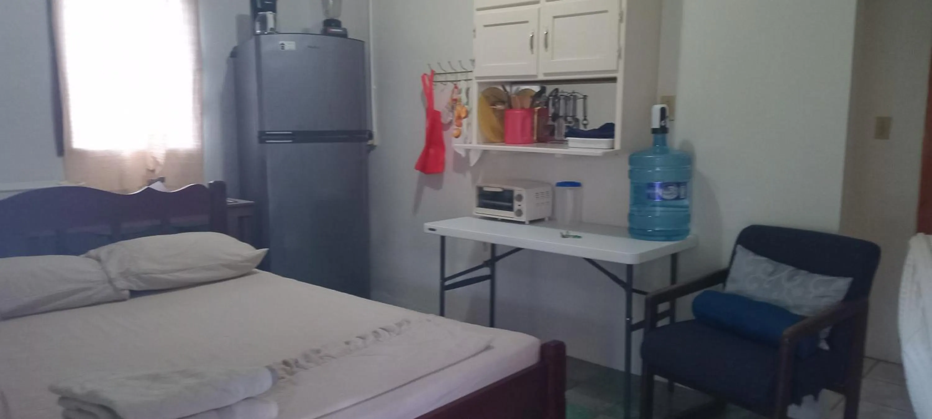 Bed in Hacienda Tropical Guest House