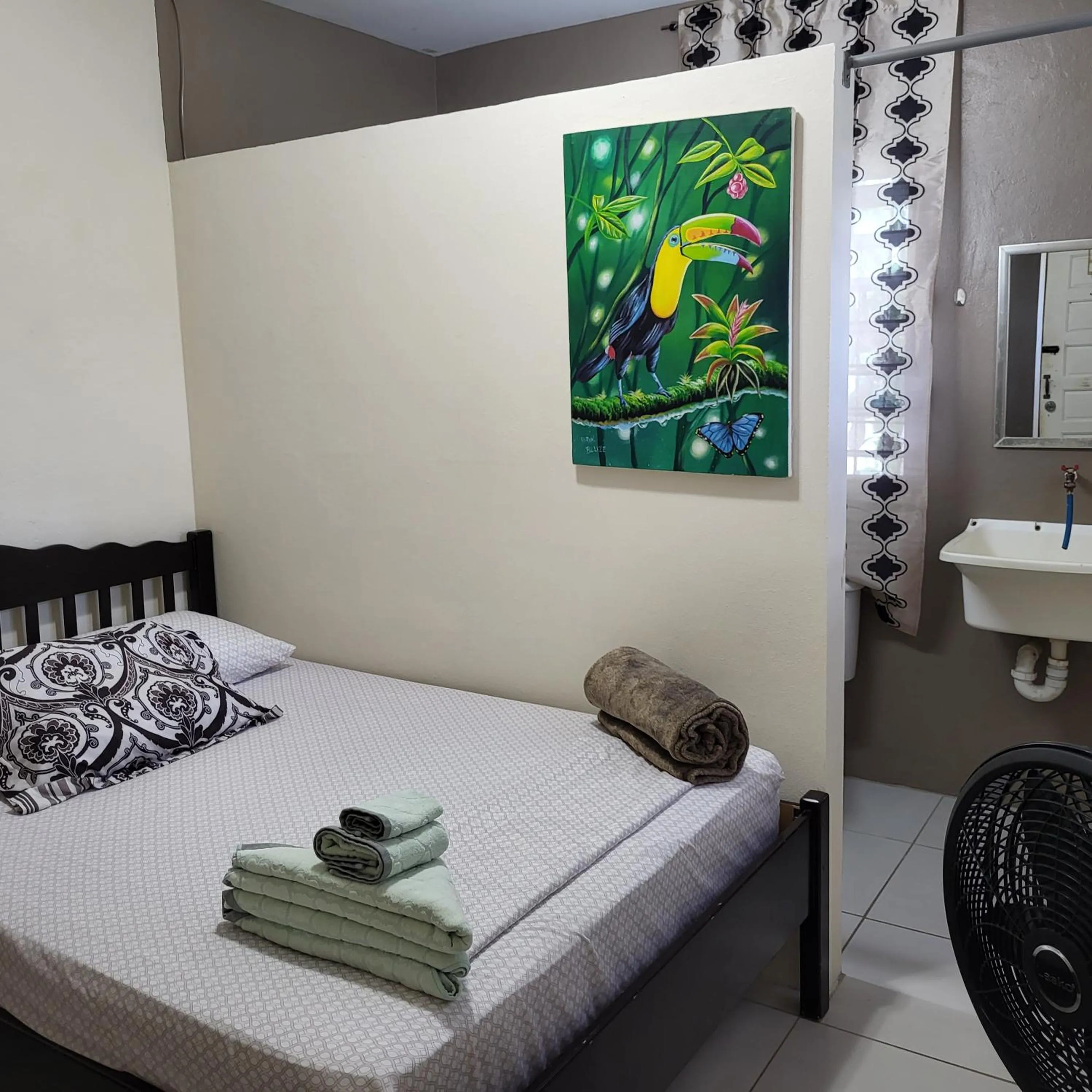 Bed in Hacienda Tropical Guest House