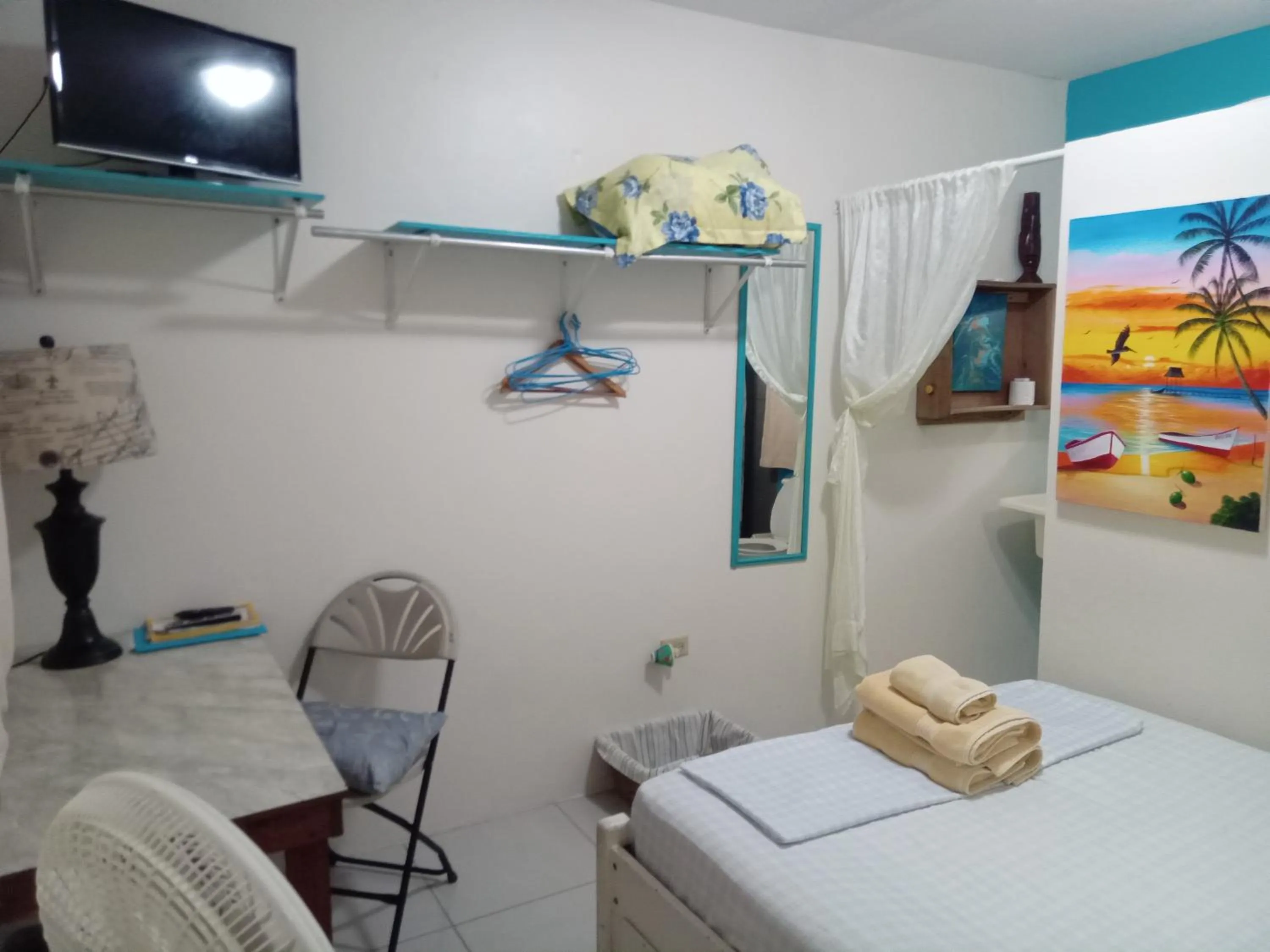 TV and multimedia, Bed in Hacienda Tropical Guest House