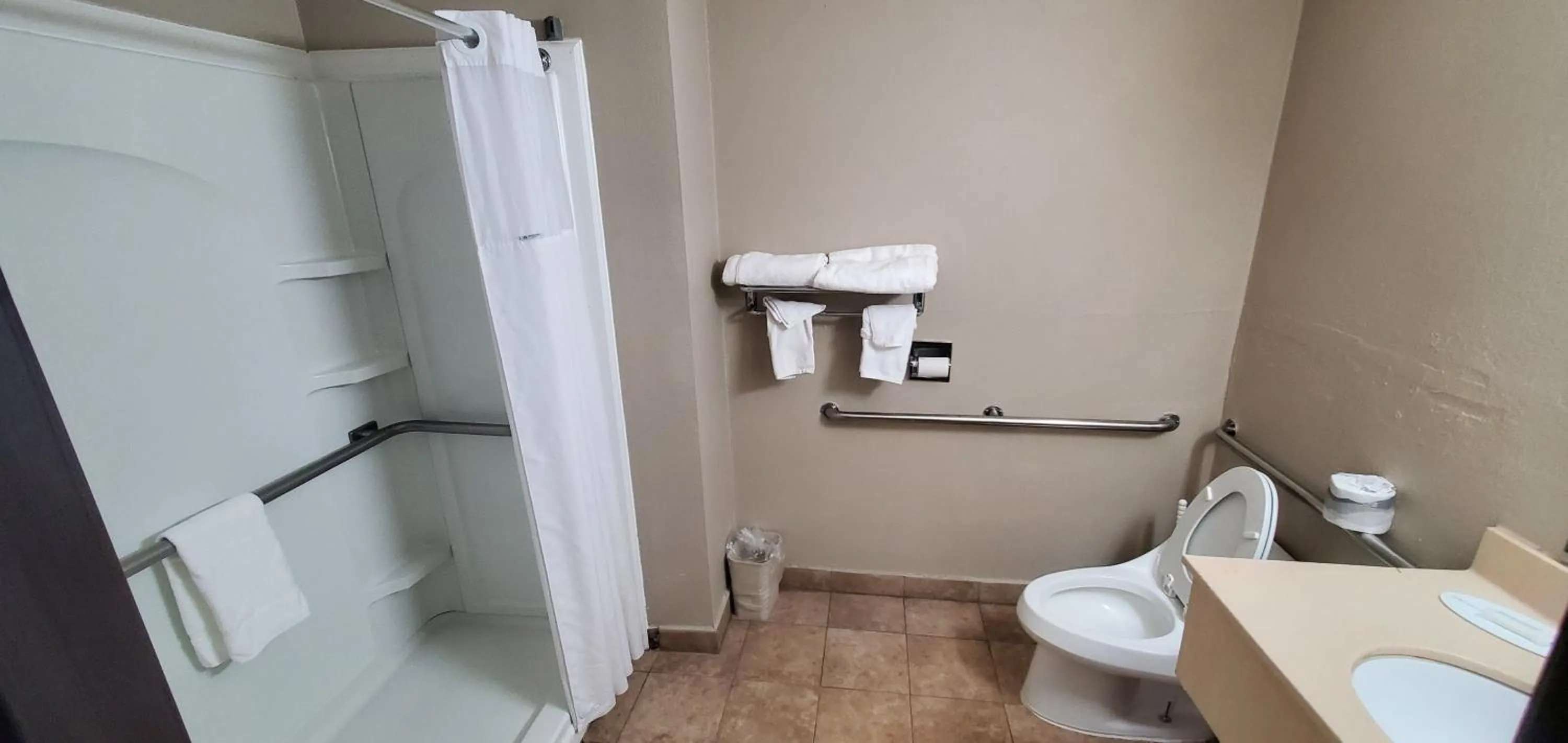 Bathroom in Super 8 by Wyndham Sterling Heights/Detroit Area
