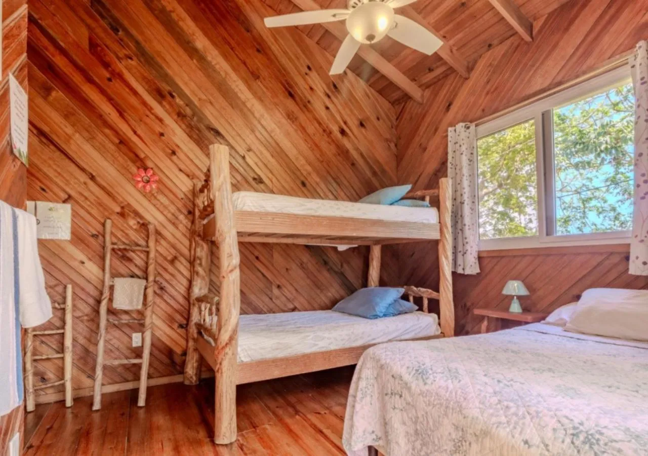 Balcony/Terrace, Bed in Guava Grove Resort & Villas