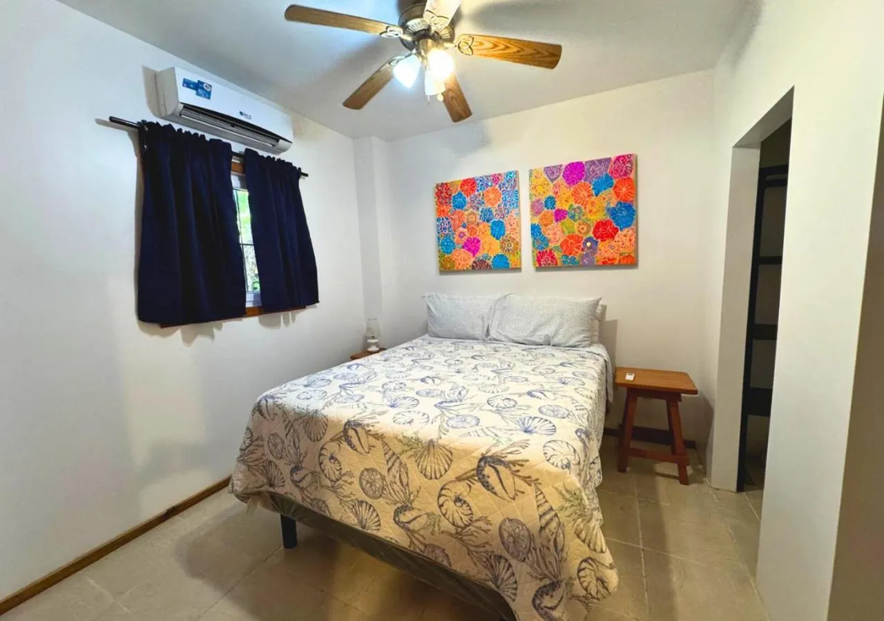 Bed in Guava Grove Resort & Villas