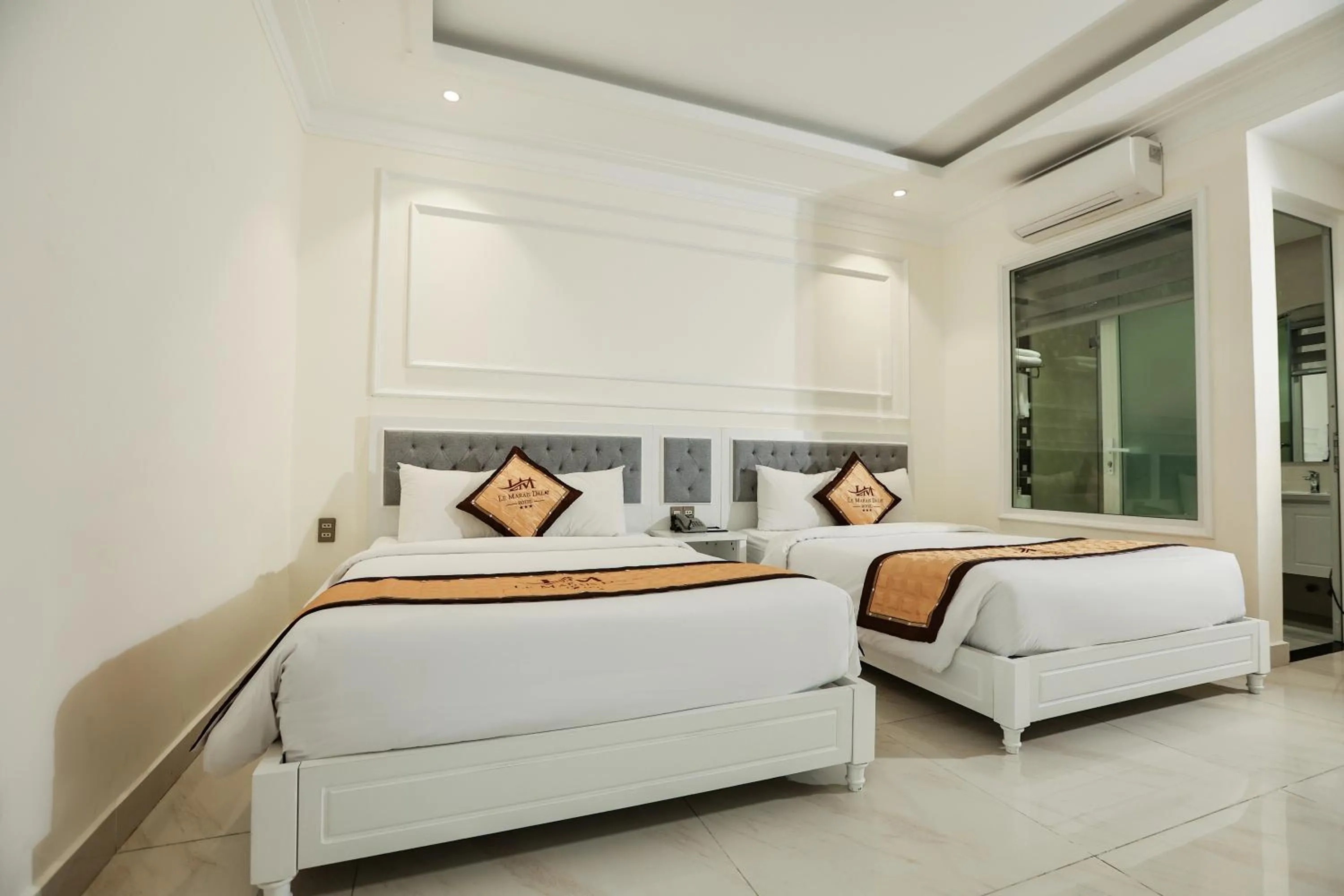 Photo of the whole room, Bed in Le Marais Hotel Dalat