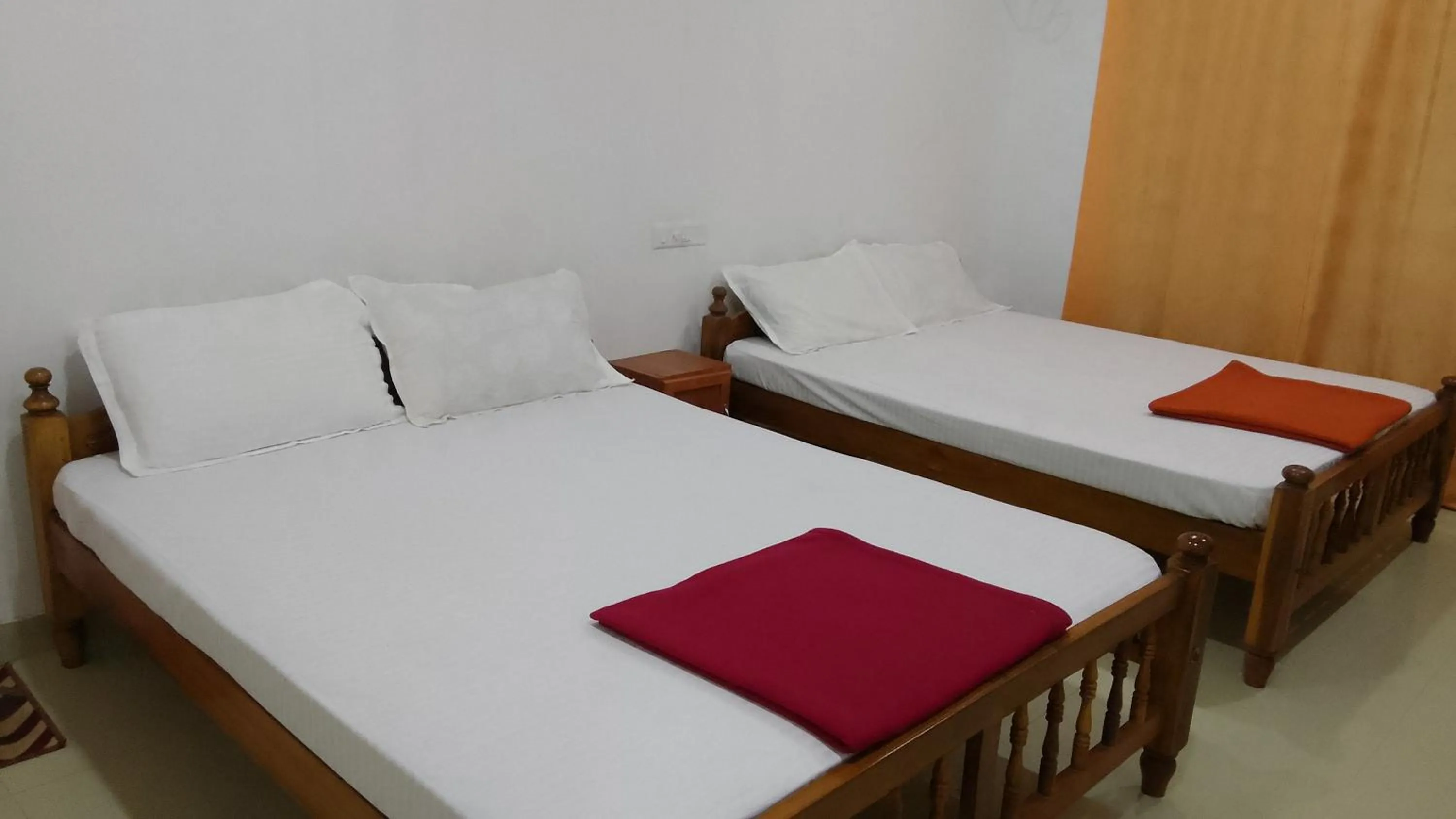 Bed in Somatheertham Resort