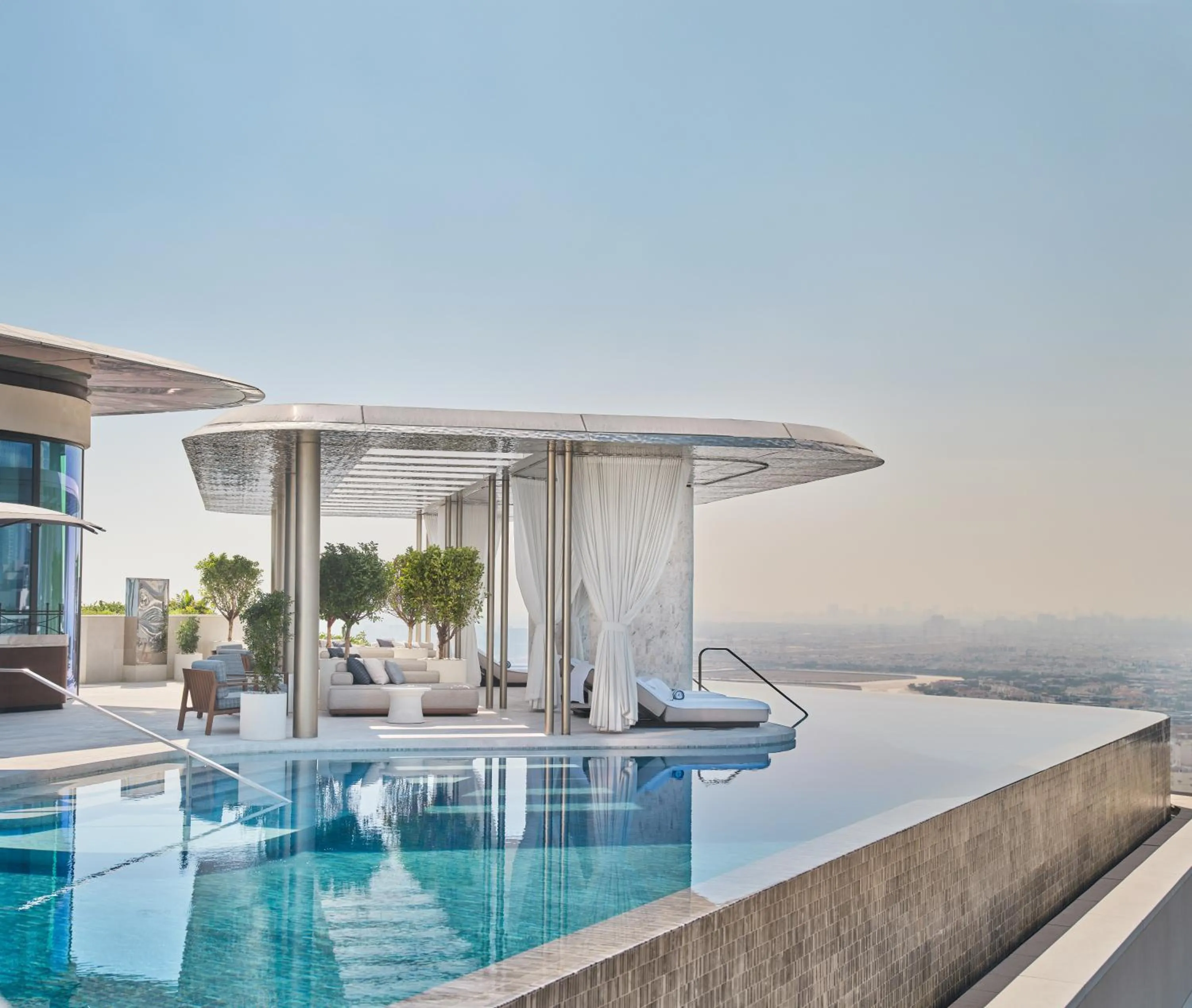 Pool view in The Lana - Dorchester Collection